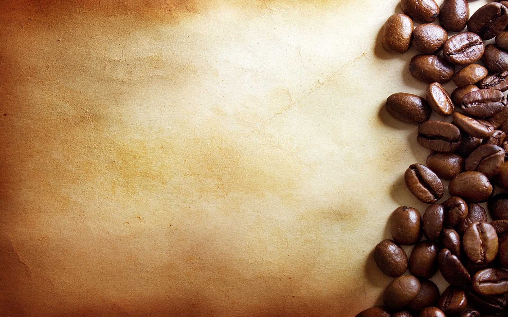 Coffee beans on aged parchment paper HD Wallpaper