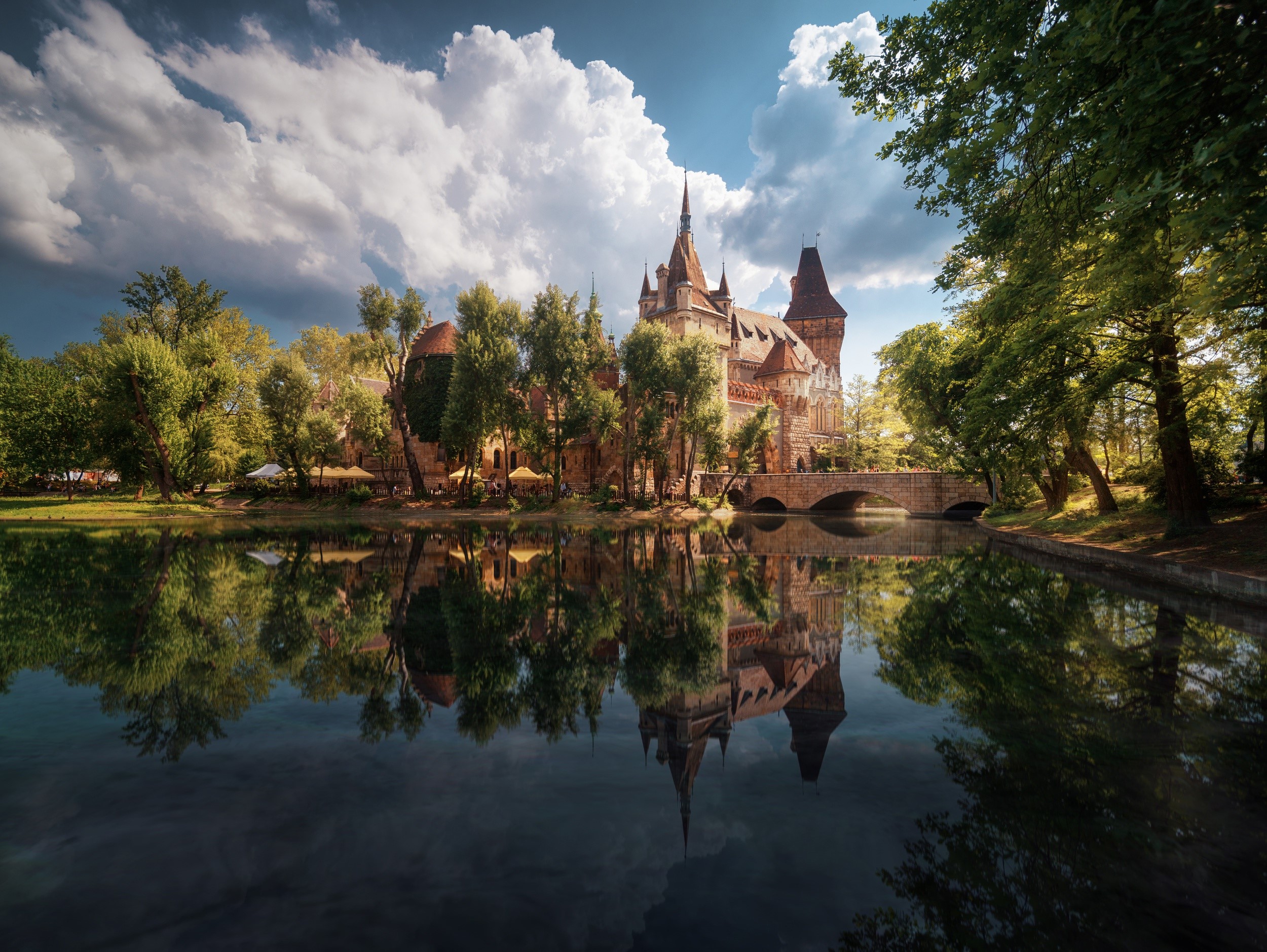 Castle reflected in water with trees and clouds HD Wallpaper