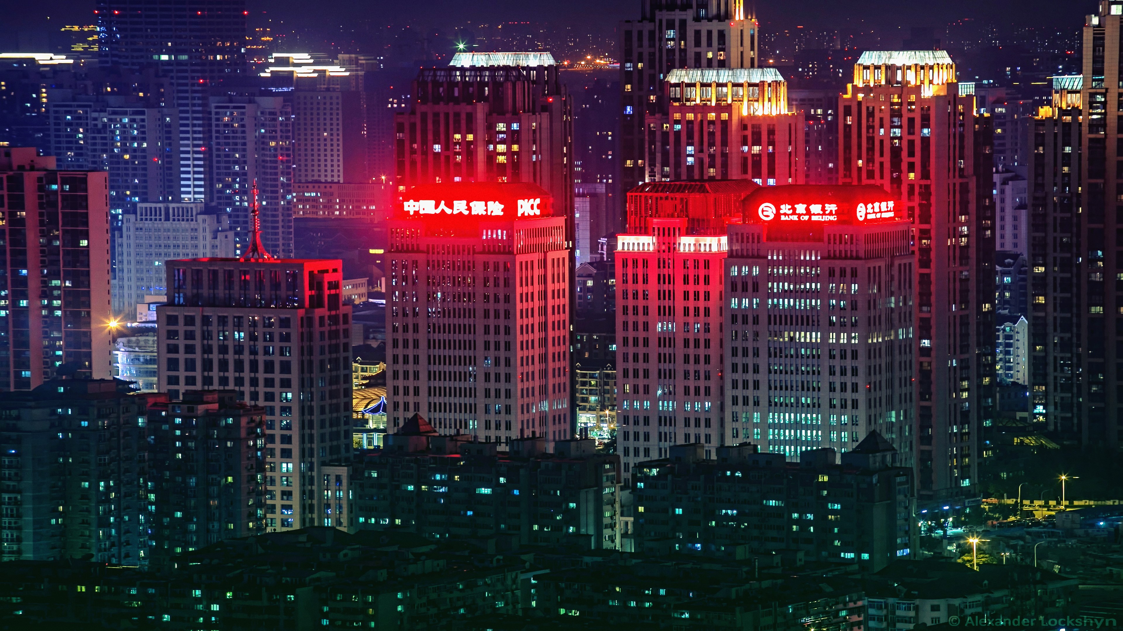 4K Cityscape with Illuminated Skyscrapers at Night HD Wallpaper