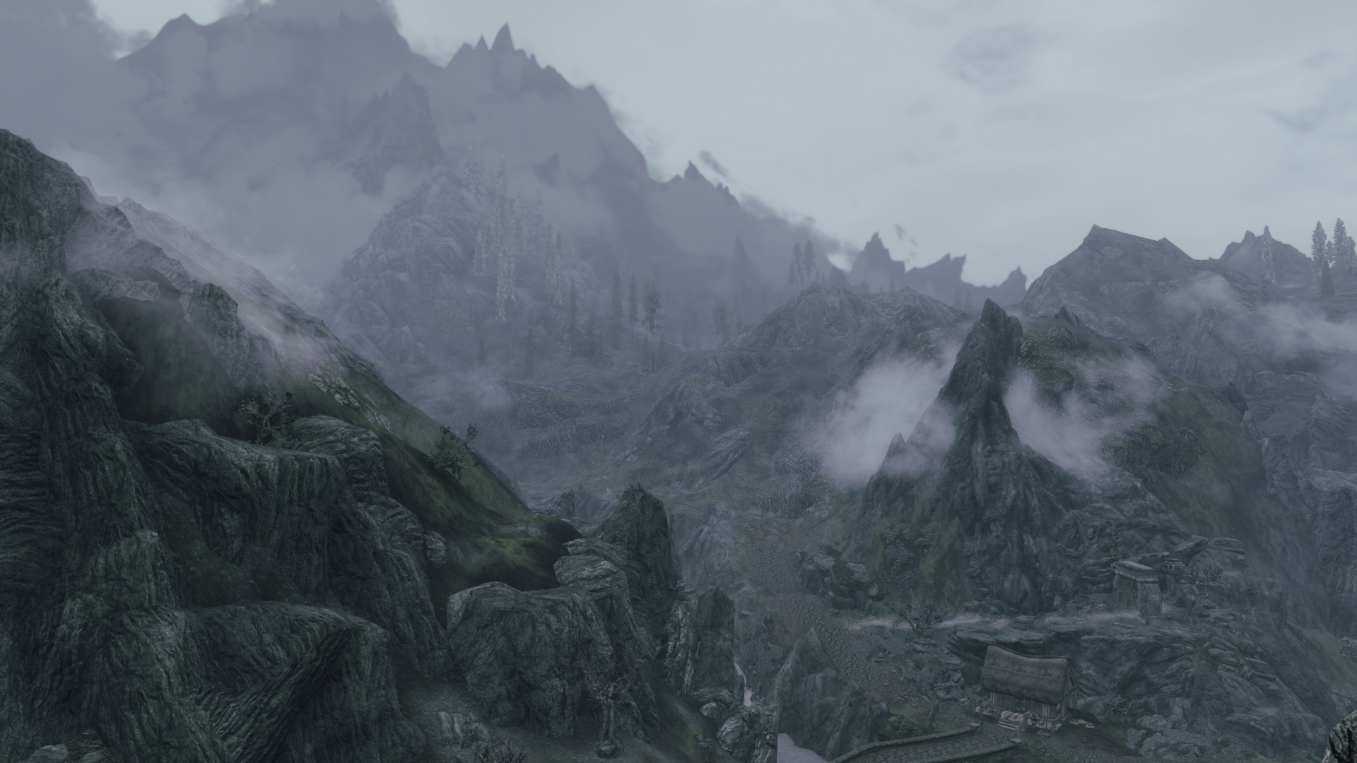 The Elder Scrolls V: Skyrim landscape with mountains and fog HD Wallpaper
