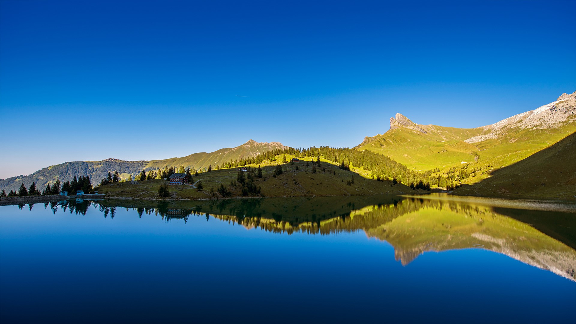 Mountain lake with reflection and clear blue sky HD Wallpaper