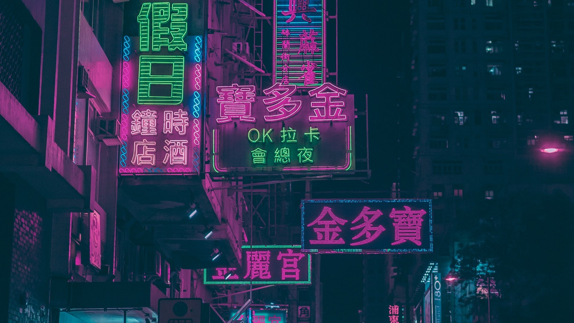 Neon signs in a city at night HD Wallpaper