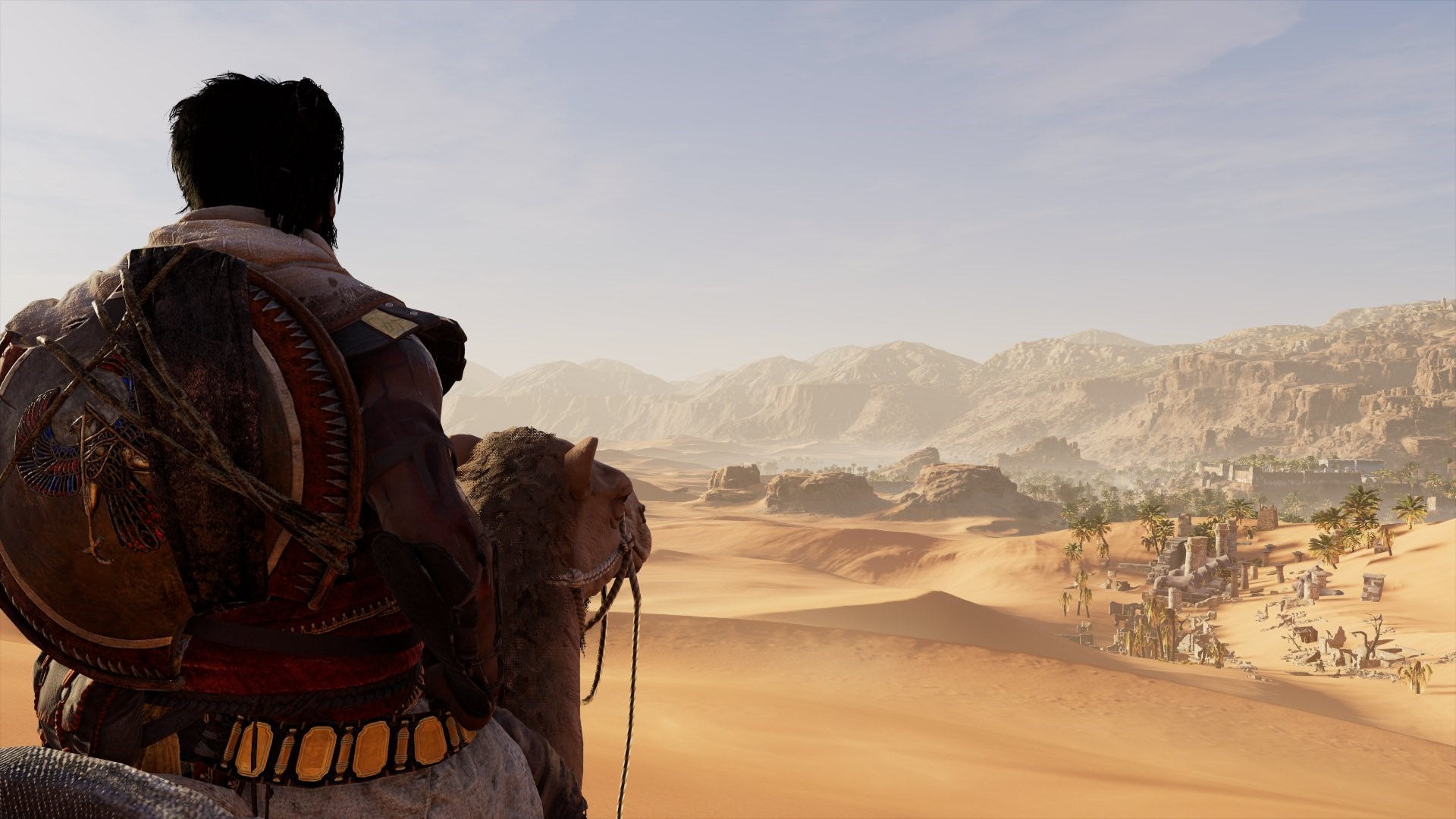Bayek riding a camel in Assassin's Creed Origins desert landscape HD Wallpaper