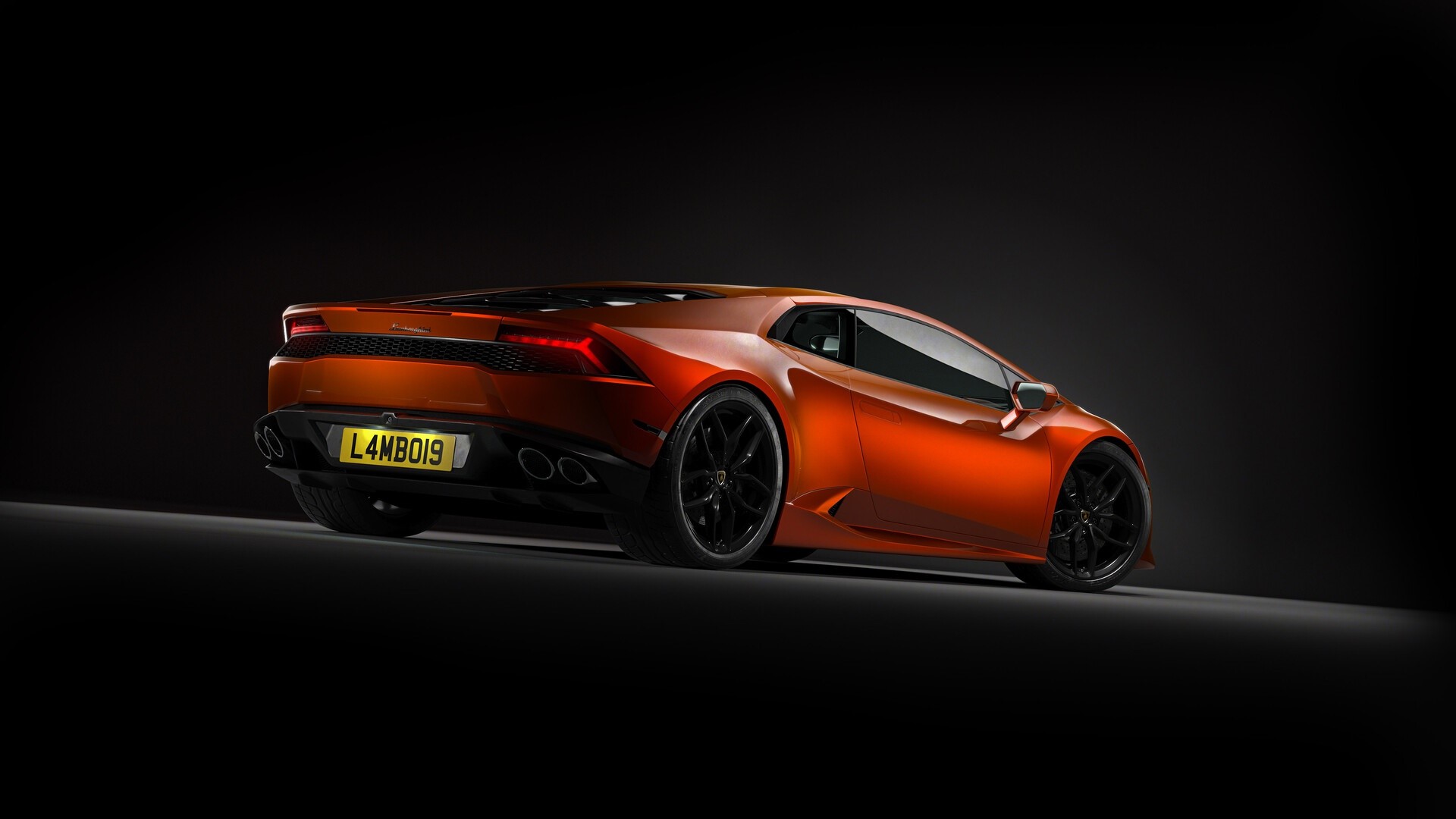 Orange Lamborghini Huracan with custom license plate HD Wallpaper