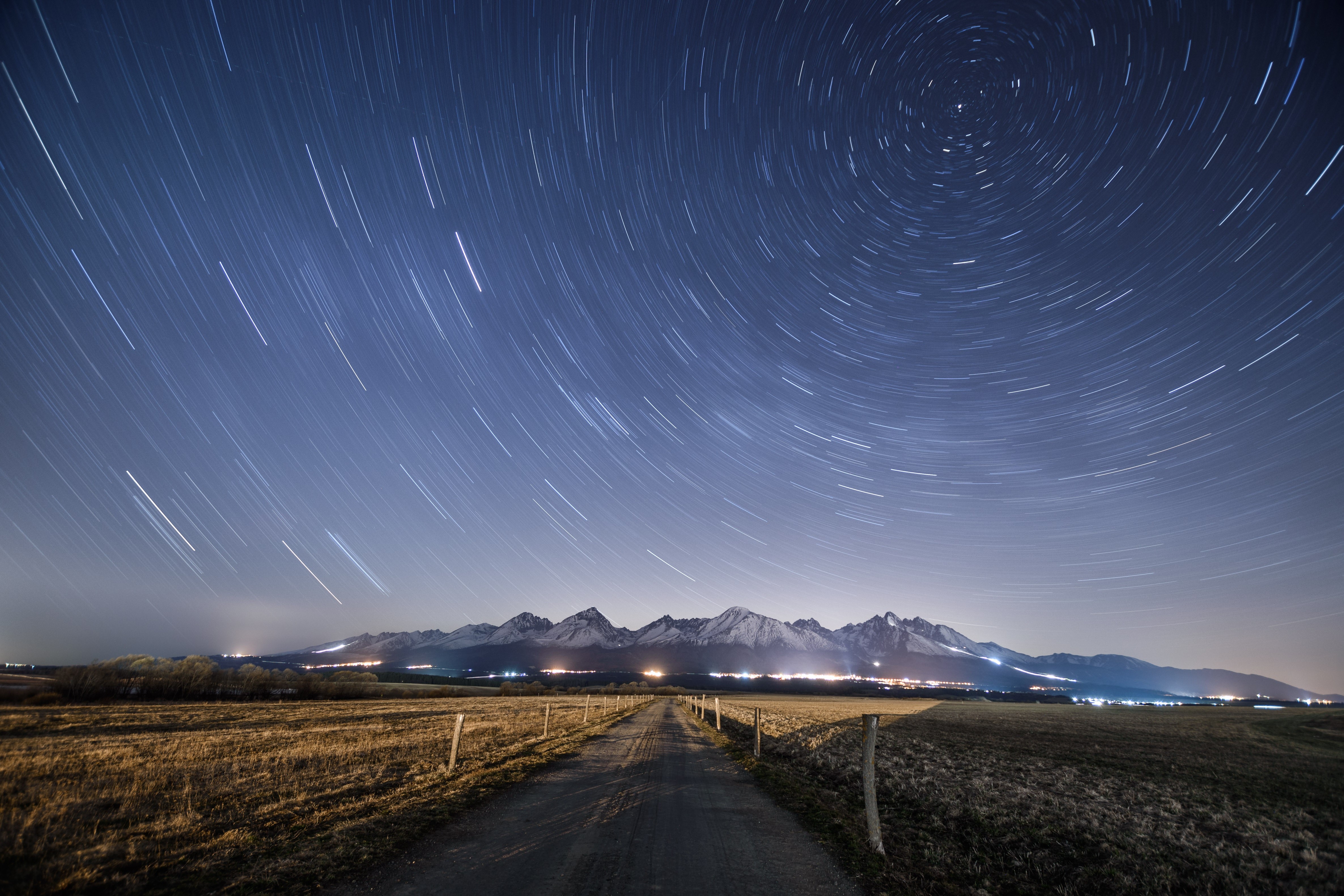 Star Trails Over Mountains at Night HD Wallpaper