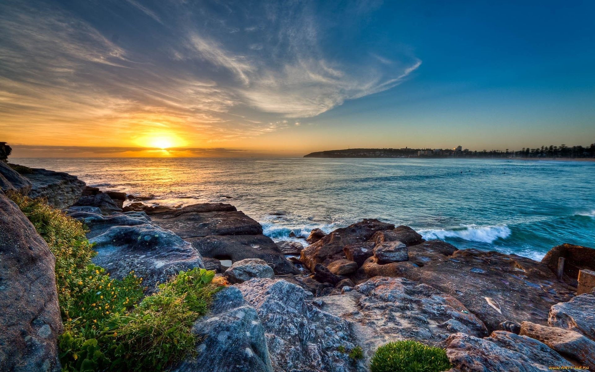 Sunset over the ocean with rocky shore HD Wallpaper