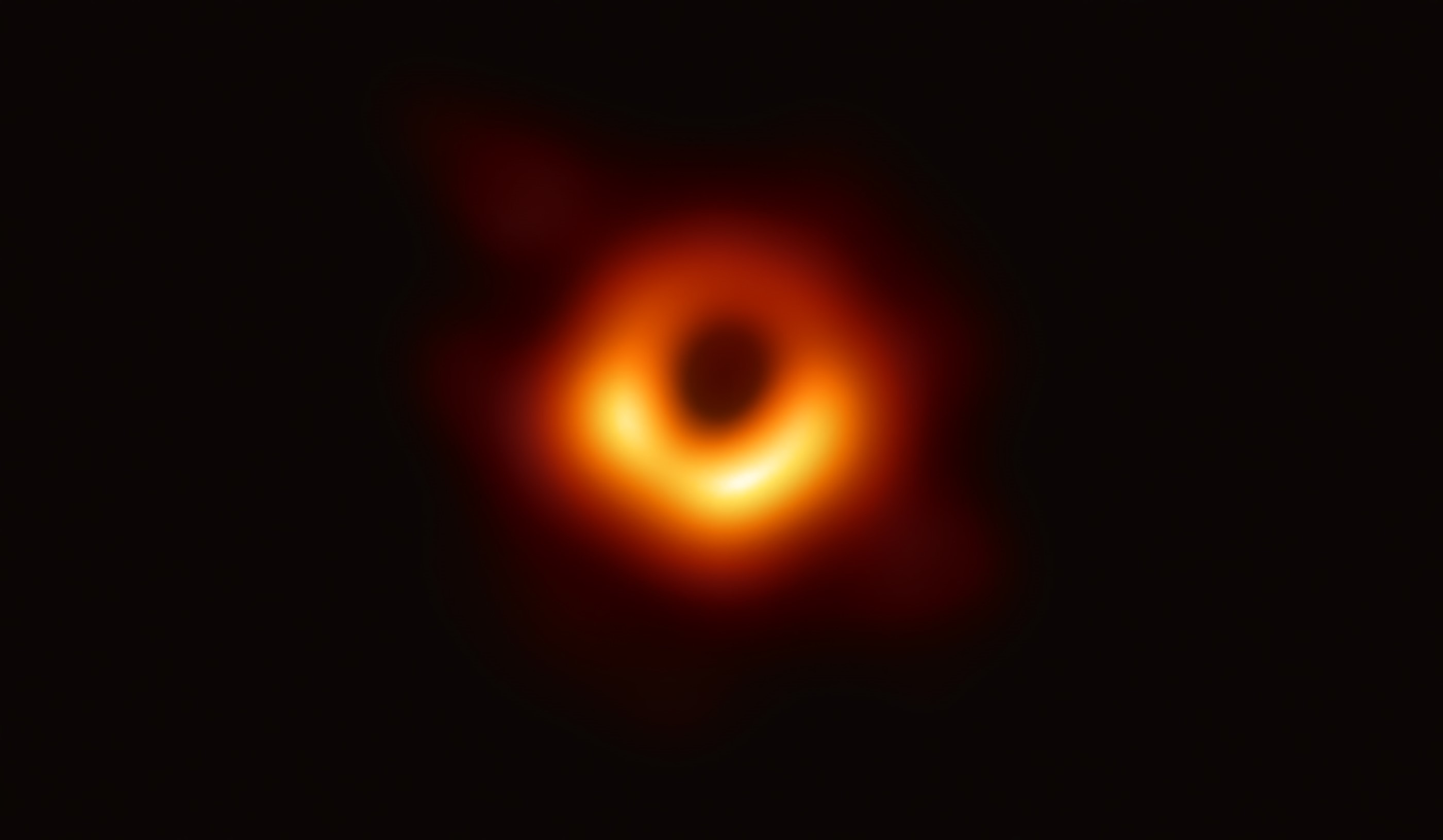 First image of a black hole HD Wallpaper