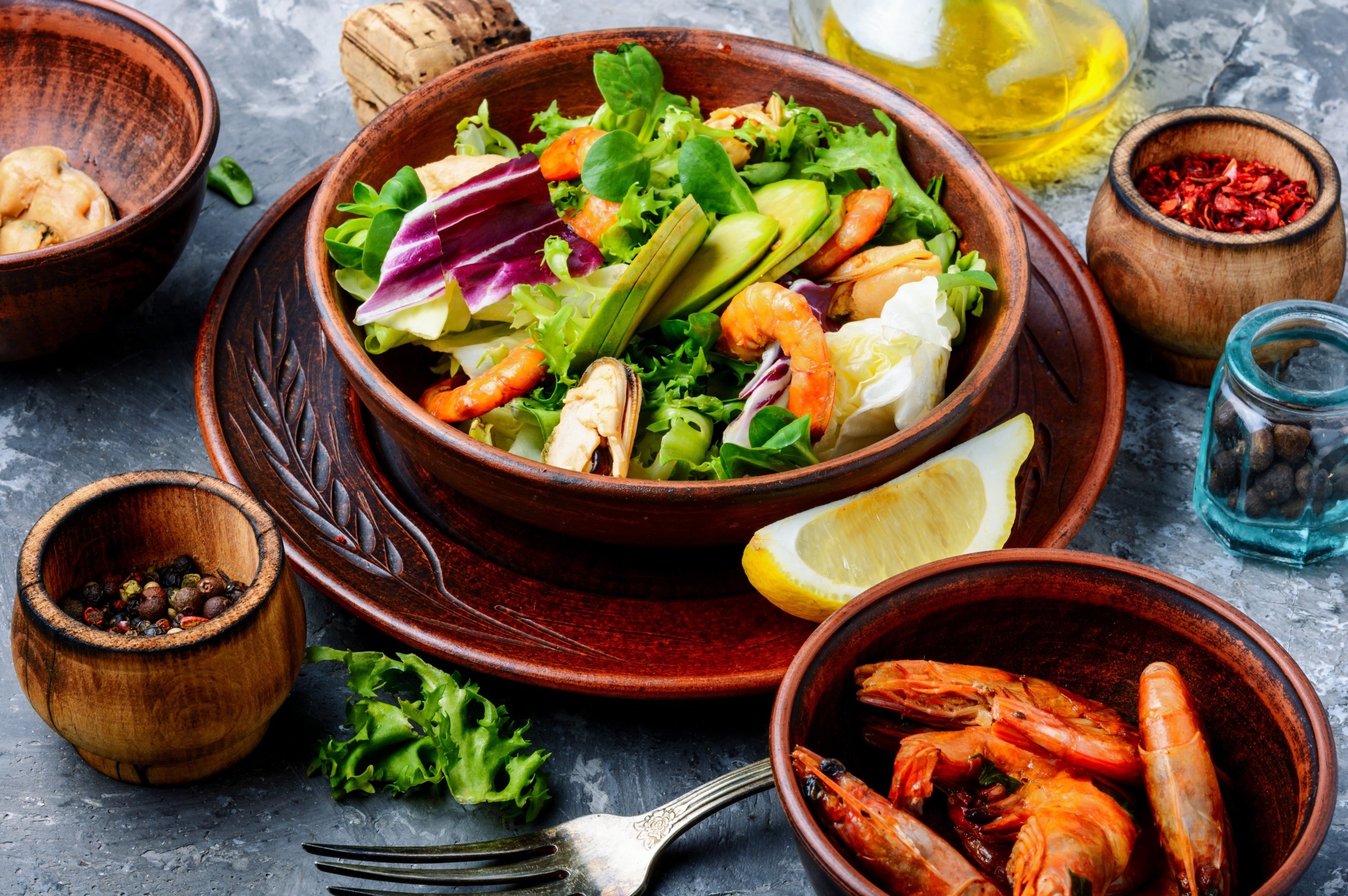 Seafood salad with shrimp, mussels, avocado, and lemon HD Wallpaper