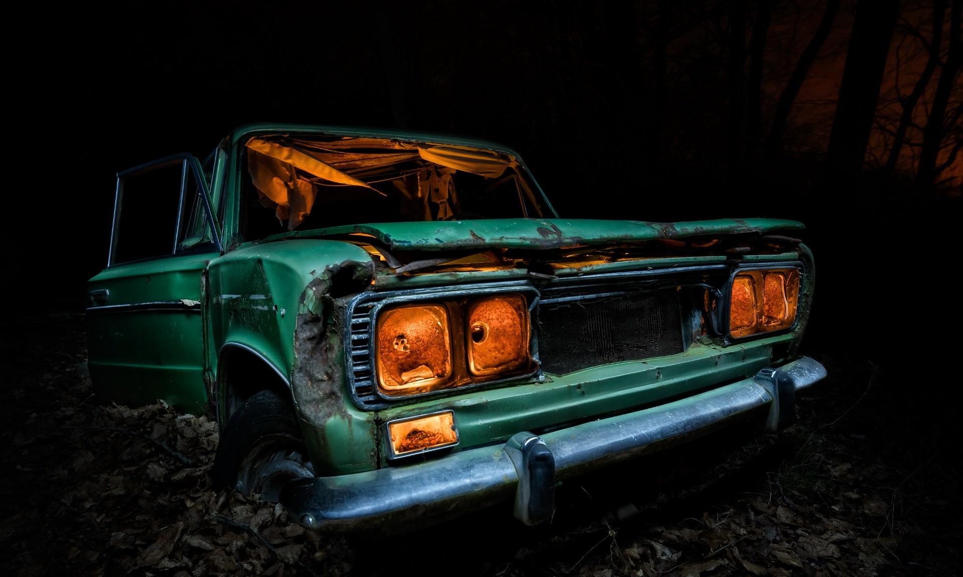 Abandoned green car at night HD Wallpaper