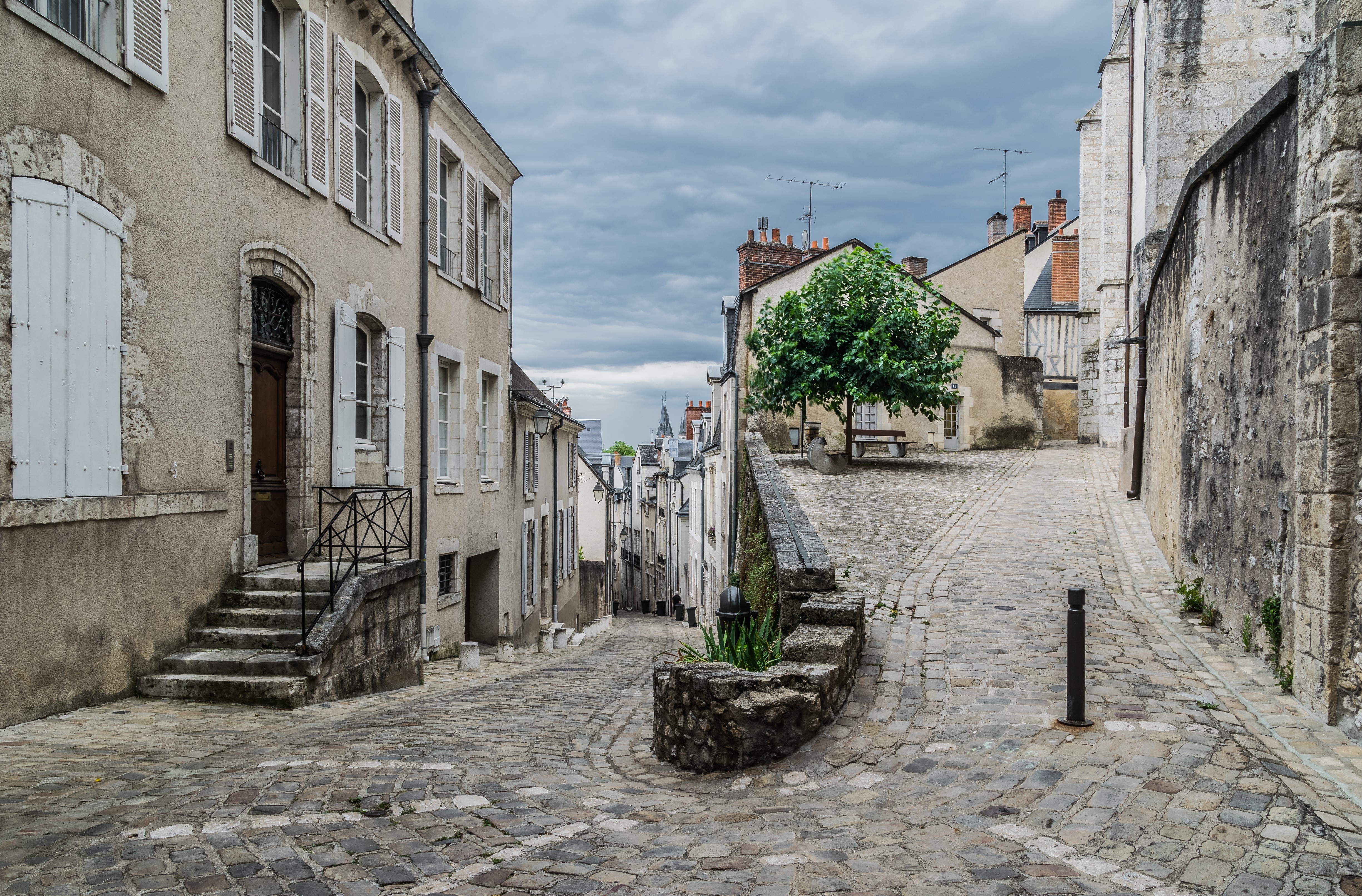 Cobblestone street in a French town HD Wallpaper