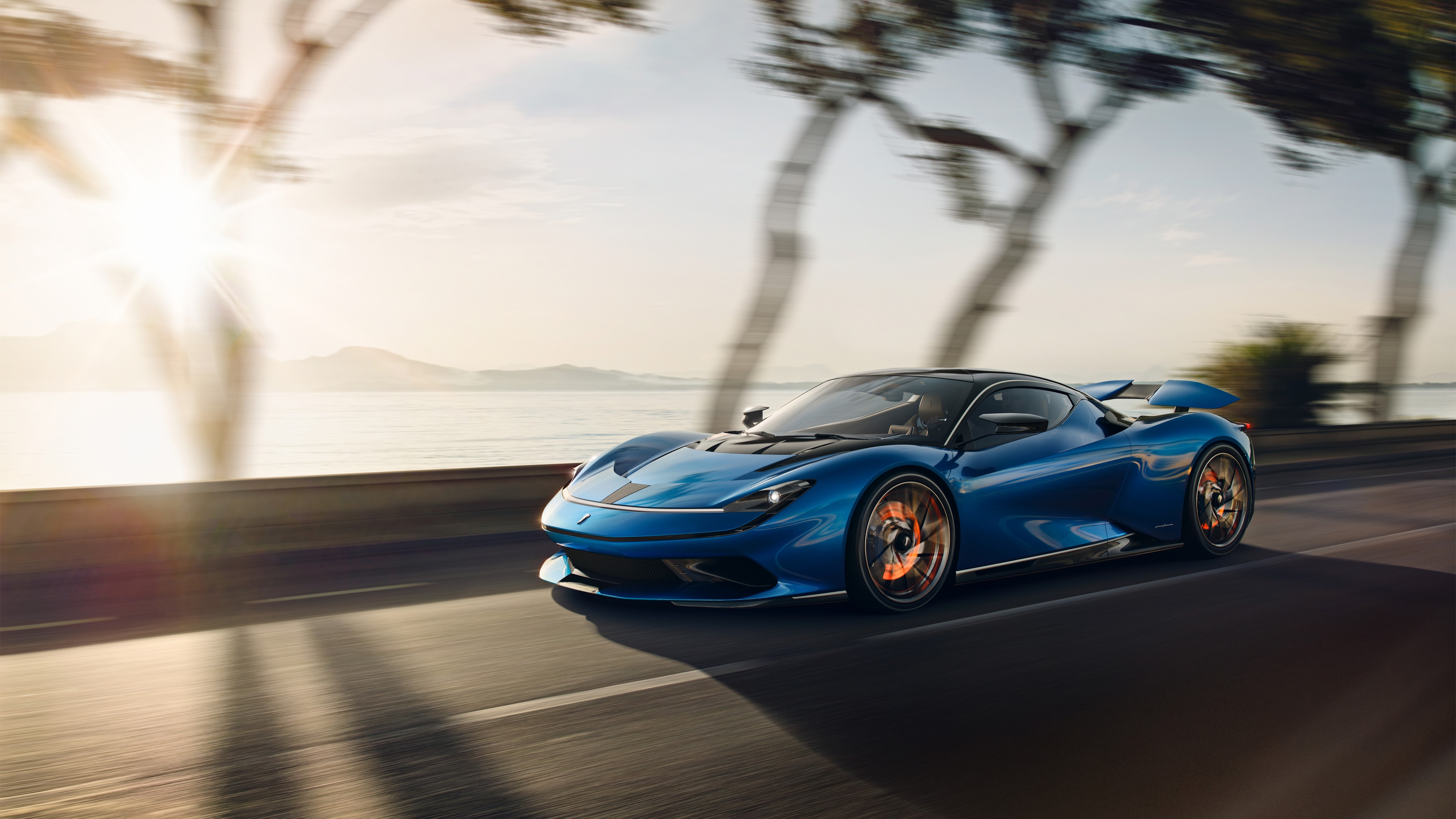 Blue Pininfarina supercar driving on a coastal road at sunset HD Wallpaper