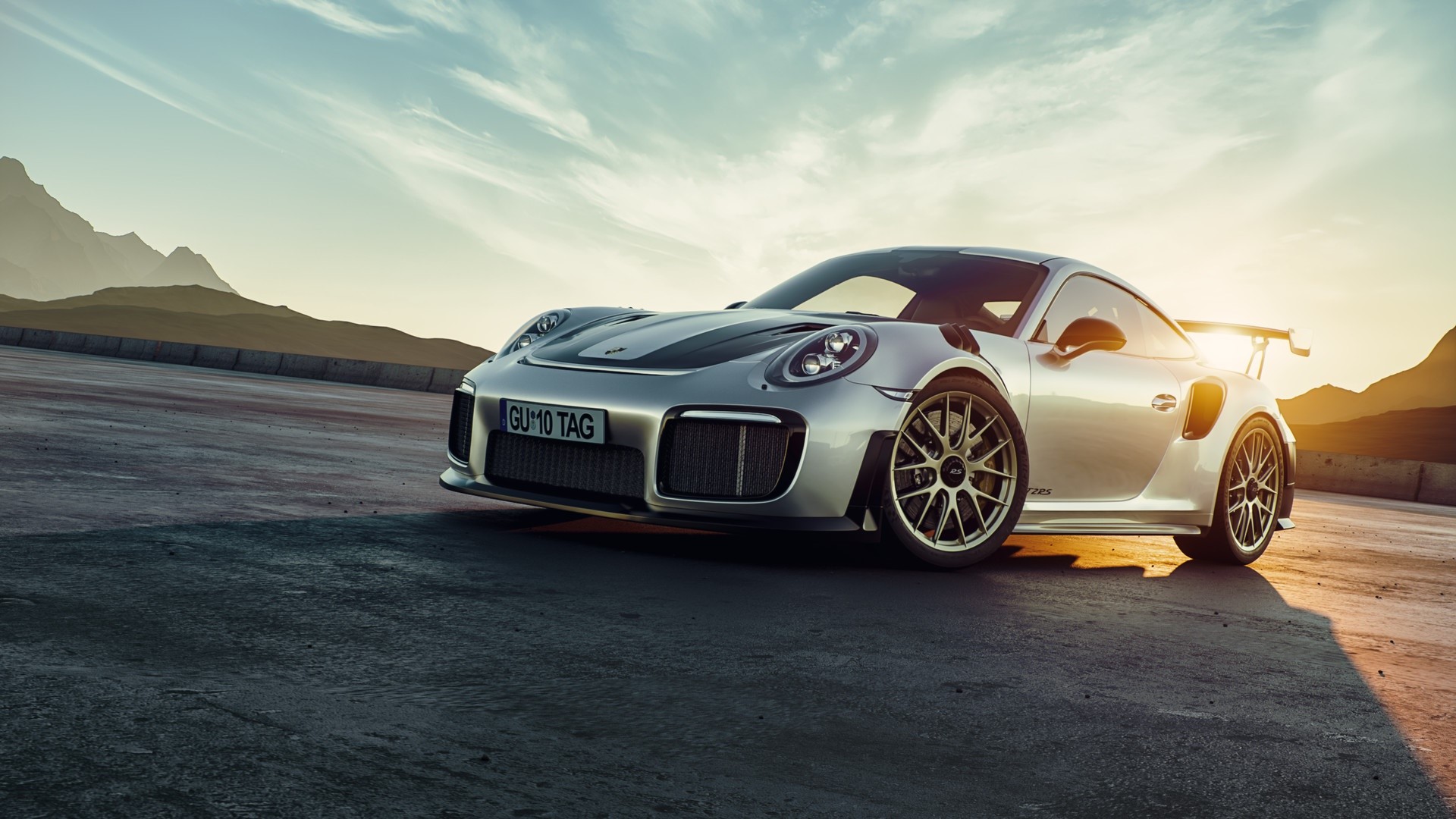Silver Porsche 911 GT2 RS on a road HD Wallpaper