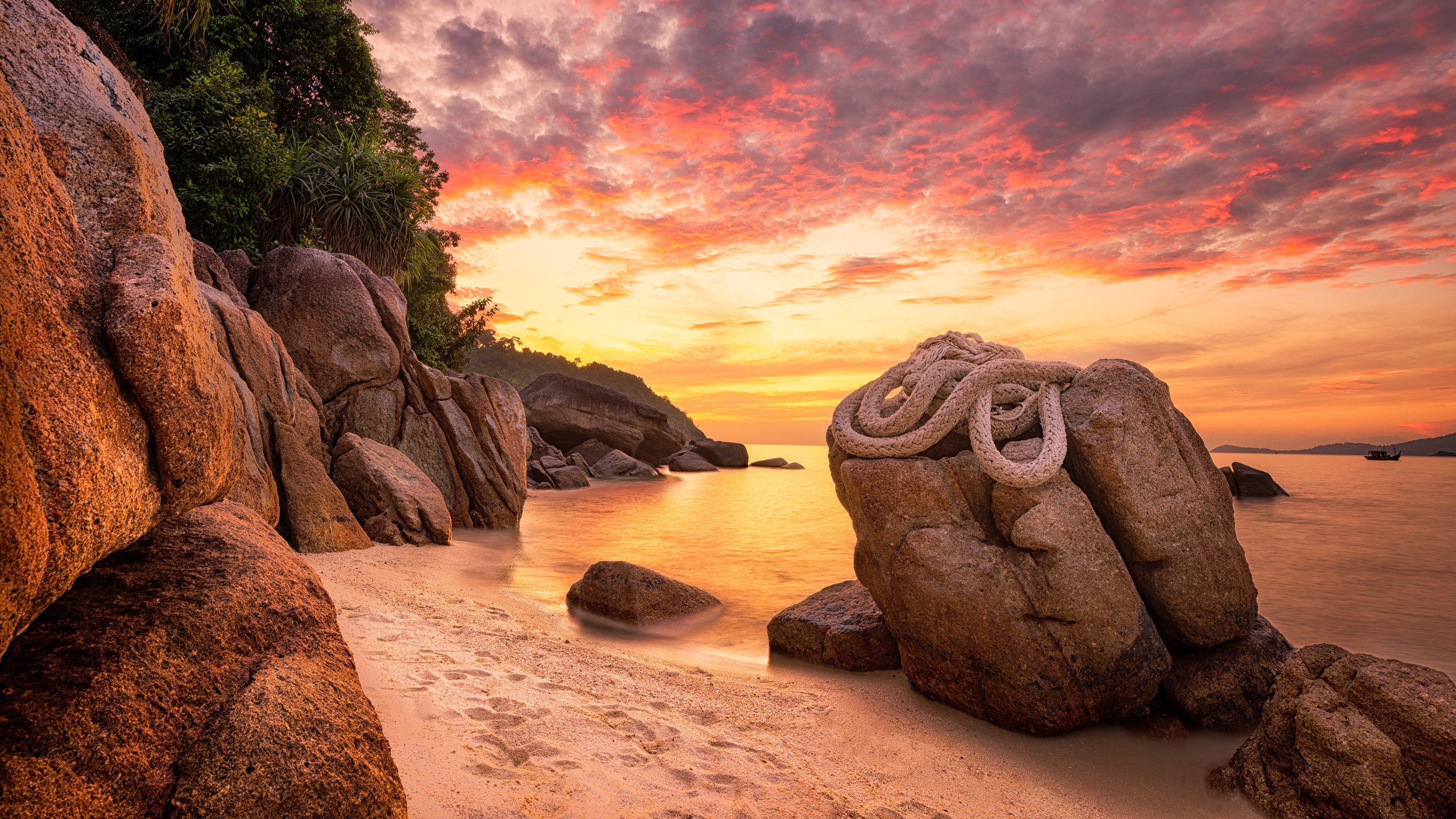 Beach with rocks and sunset sky HD Wallpaper