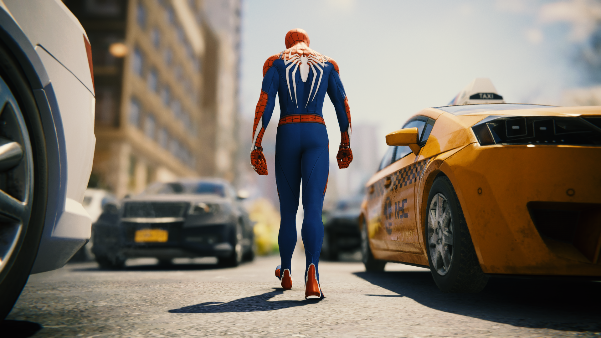 Spider-Man walking down a city street HD Wallpaper