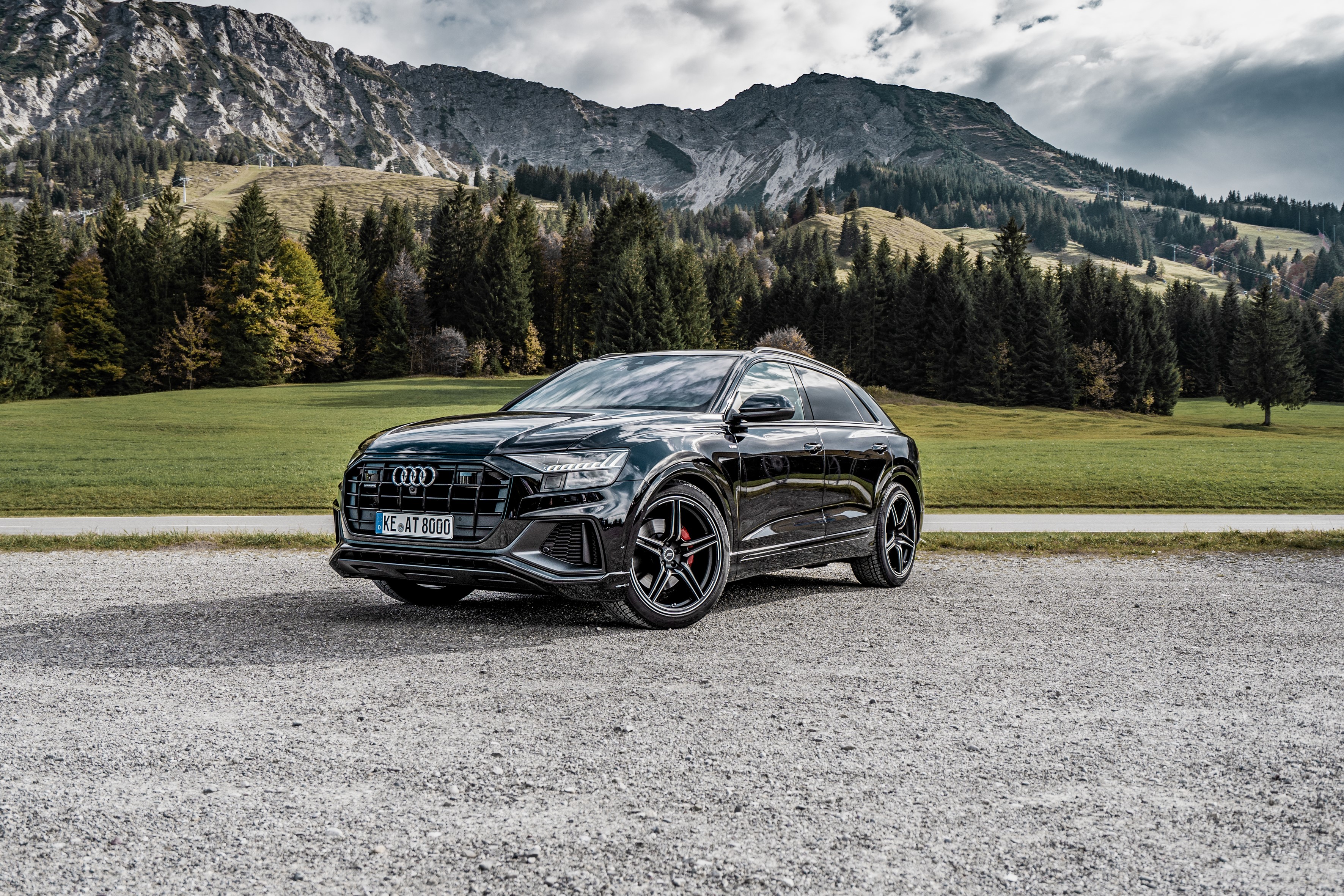 Black ABT Audi Q8 in a mountain landscape HD Wallpaper