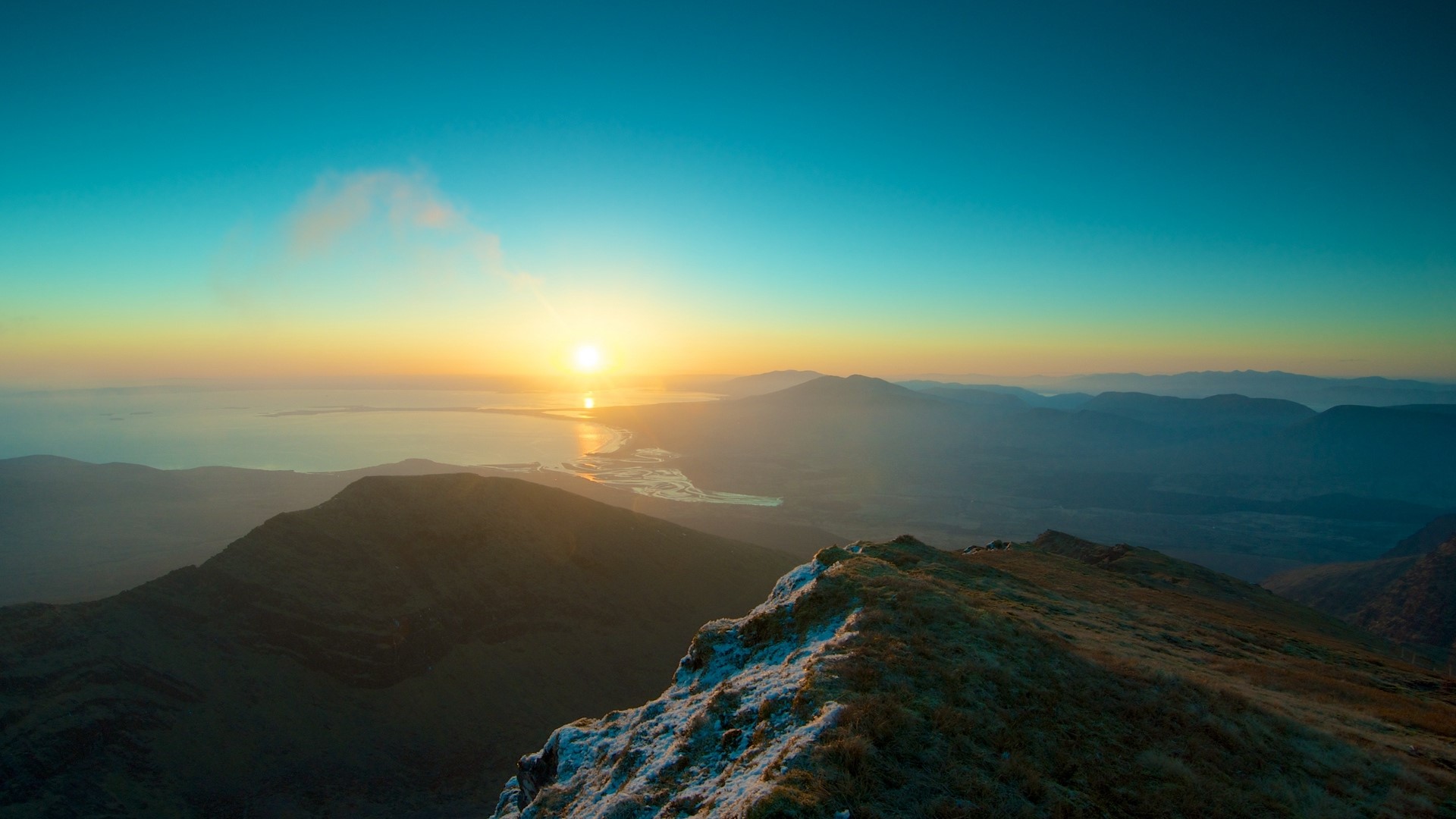 Sunset over mountains and bay HD Wallpaper