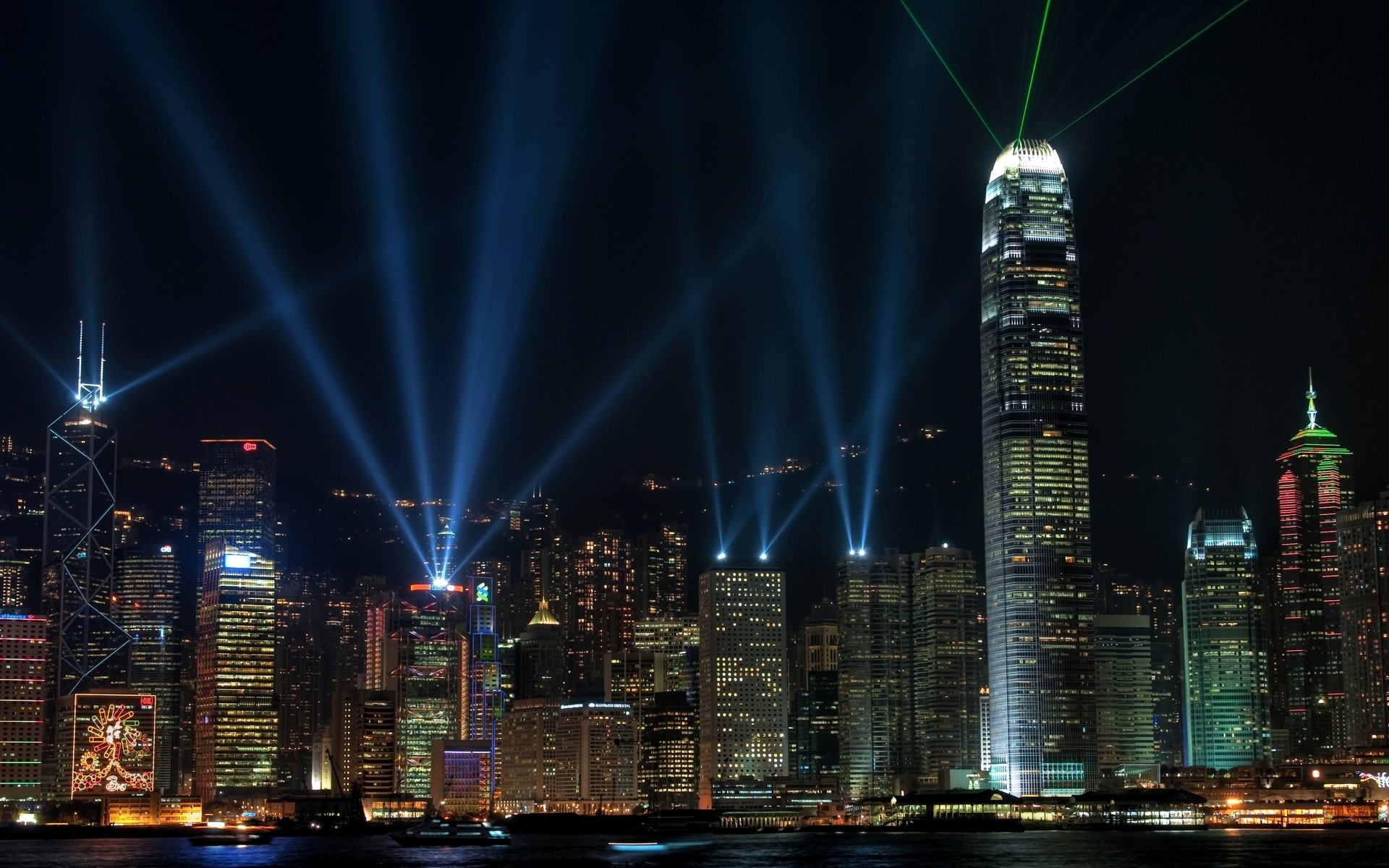 Hong Kong cityscape with illuminated skyscrapers at night HD Wallpaper