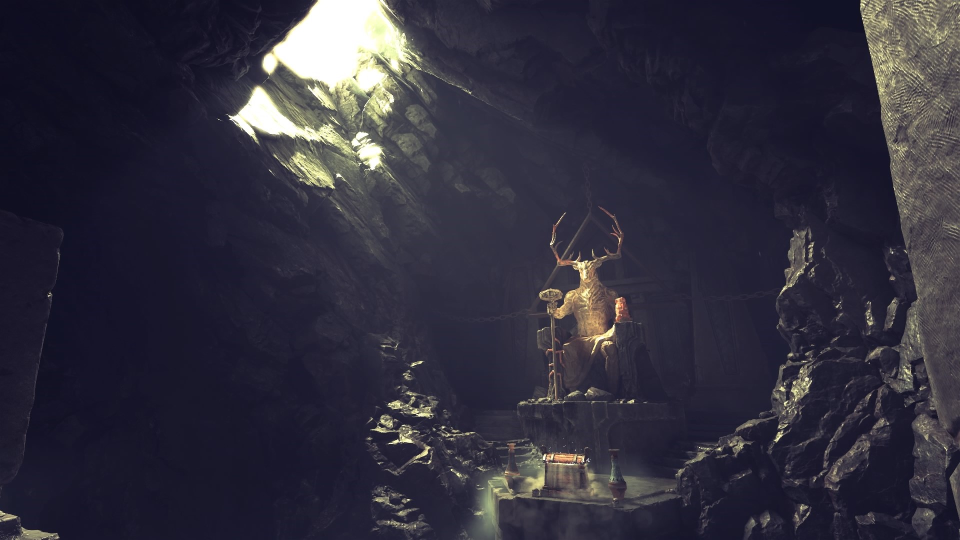Statue of a deer-headed figure in a cave from God of War HD Wallpaper
