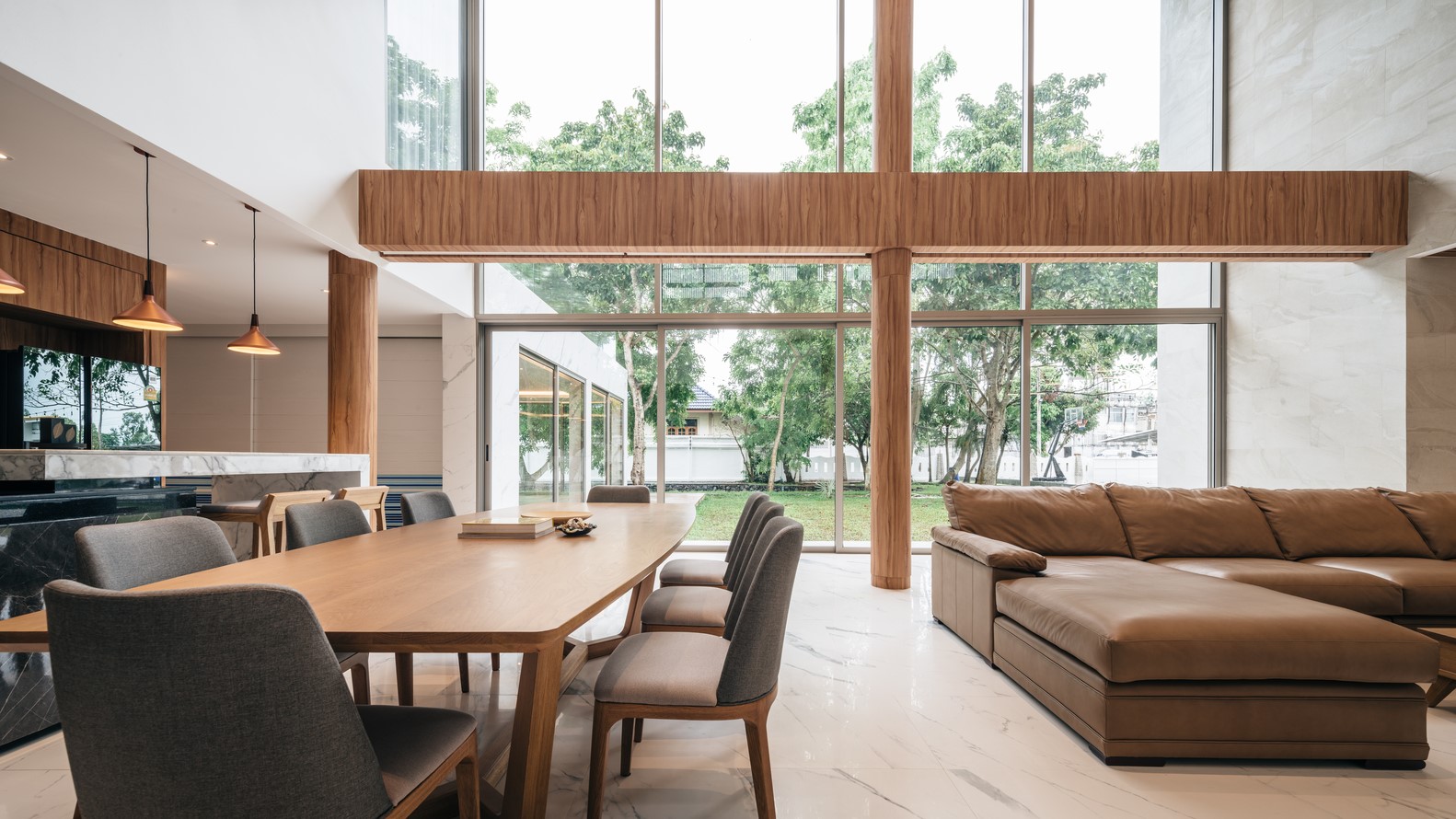 Modern dining room with large windows and sectional sofa HD Wallpaper