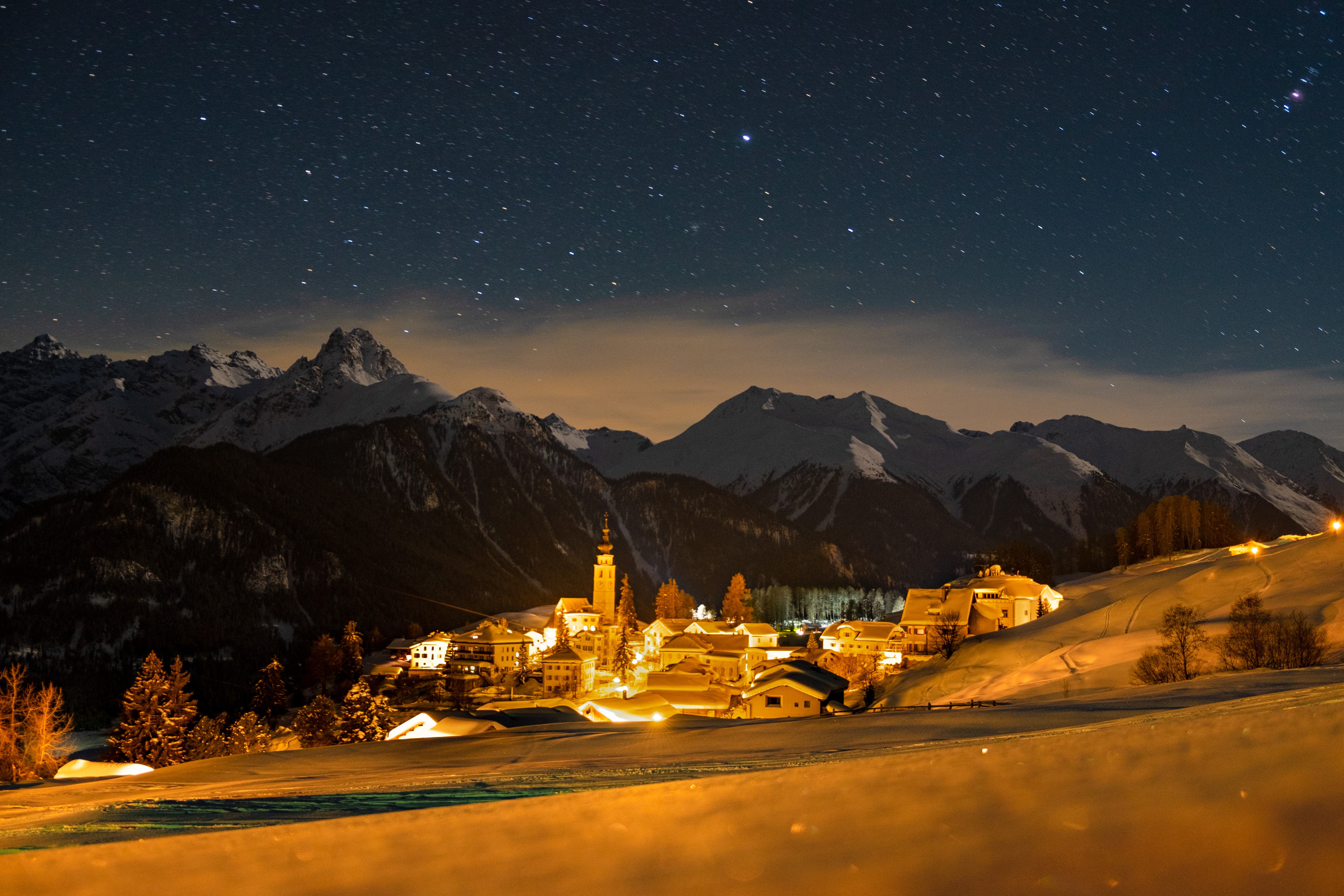 4K Switzerland Village Under Stars in Winter HD Wallpaper