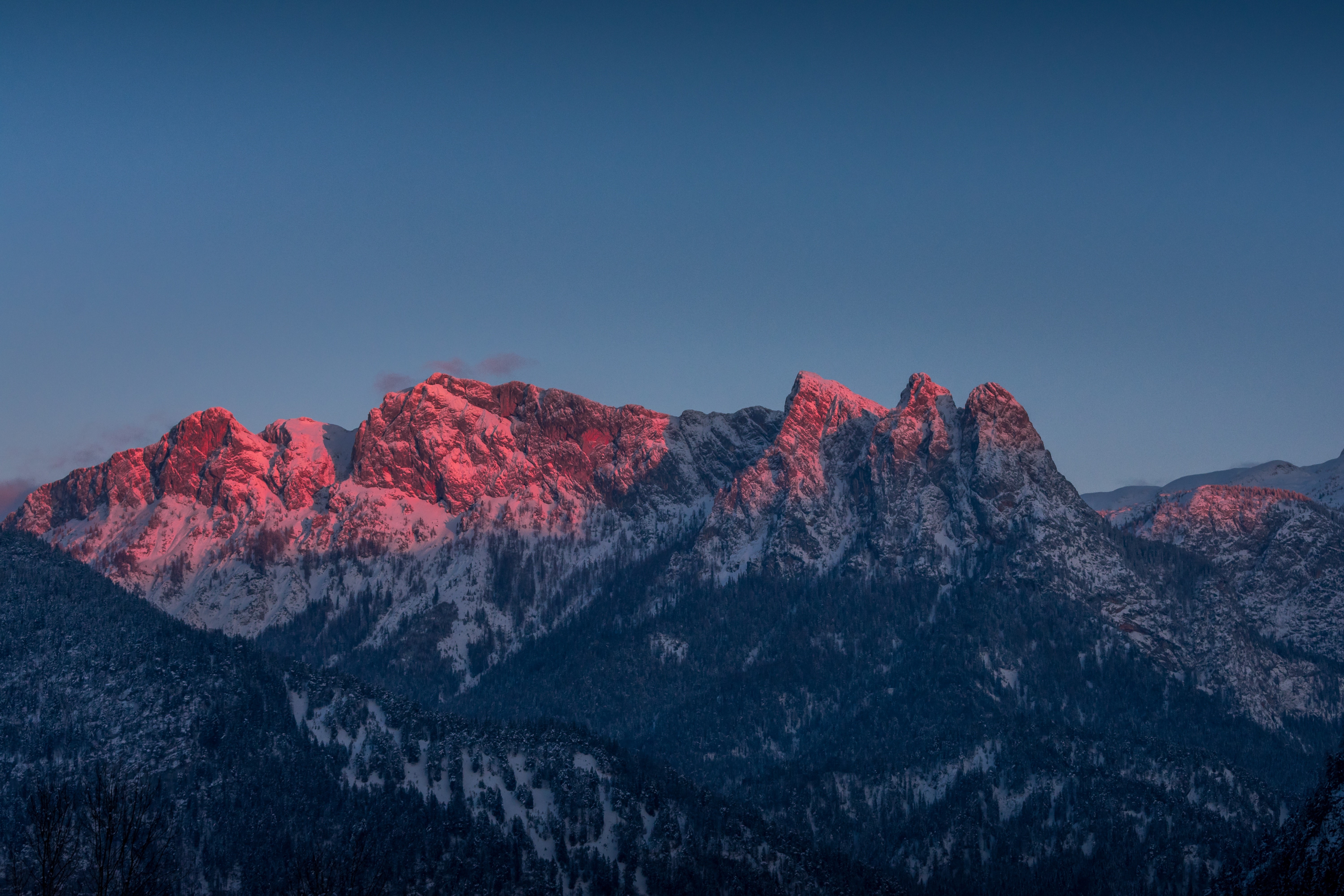 4K Winter Sunset Over Snow-Covered Mountains HD Wallpaper