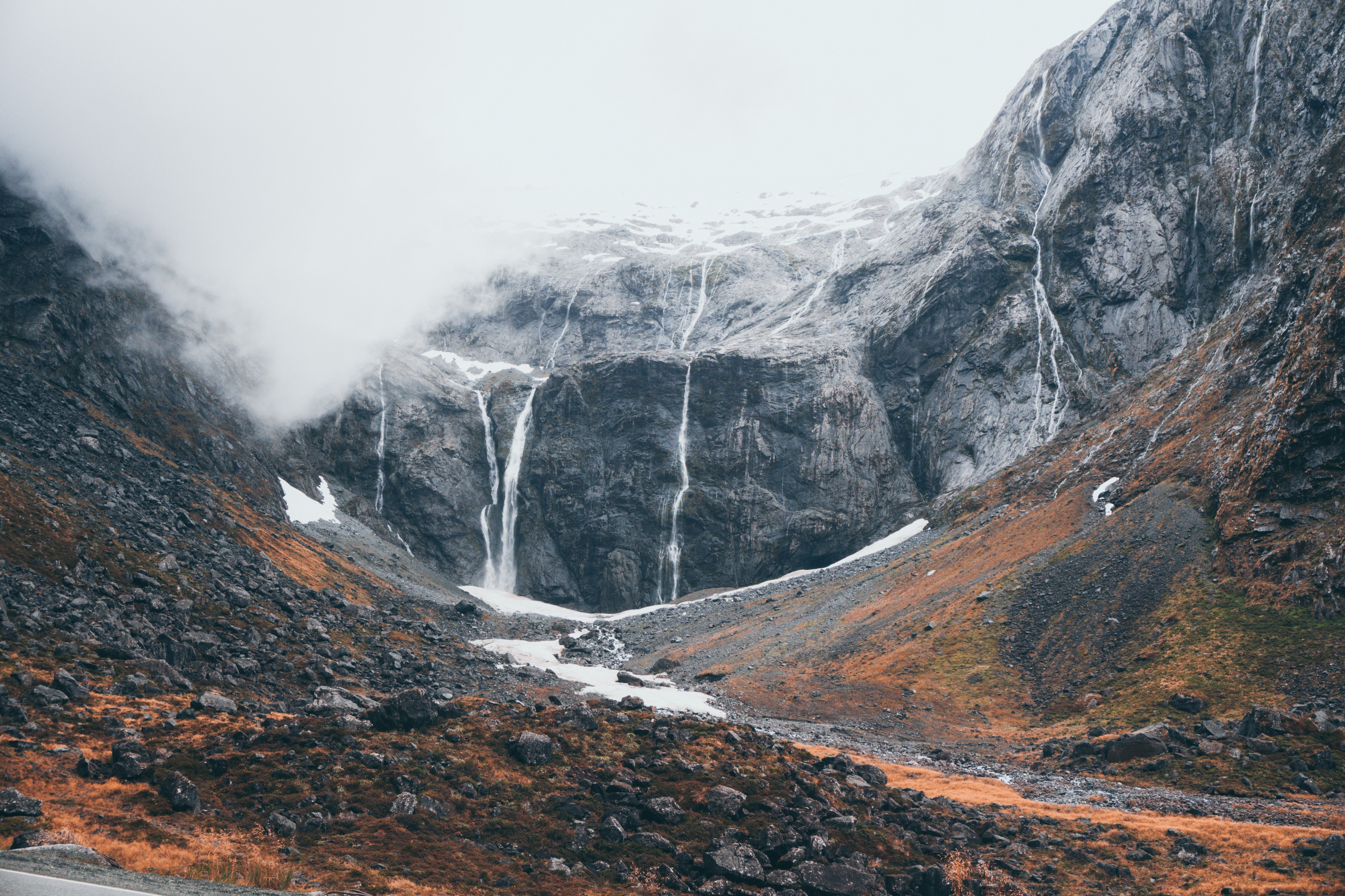 4K mountain landscape with waterfalls and fog HD Wallpaper