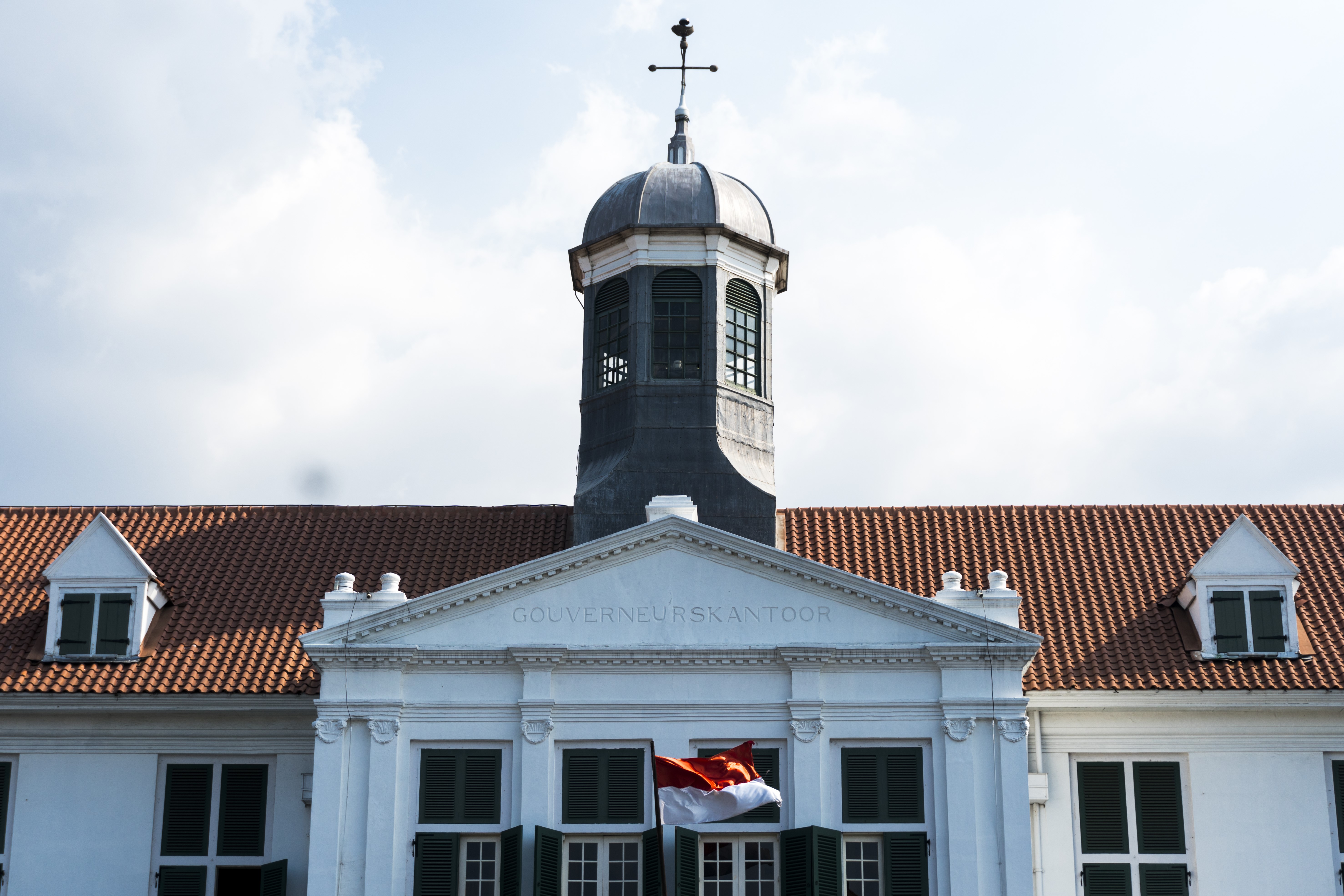 Gouverneurkantoor building with Indonesian flag in Jakarta HD Wallpaper