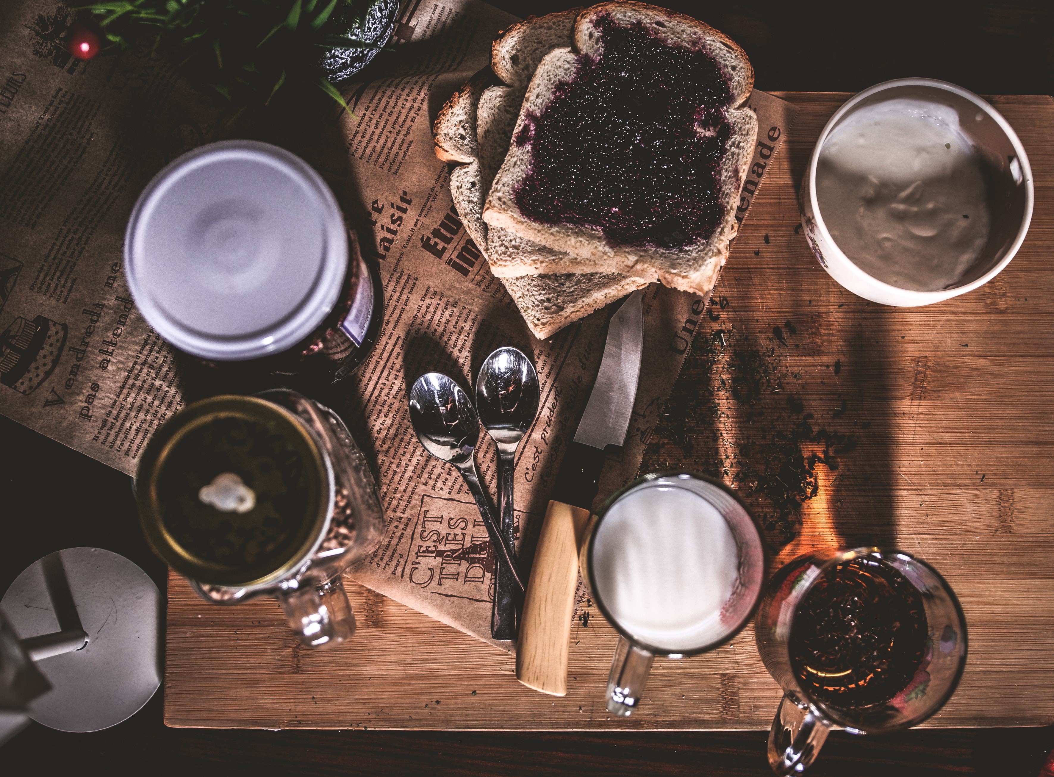 Breakfast spread with toast, jam, coffee, and milk HD Wallpaper