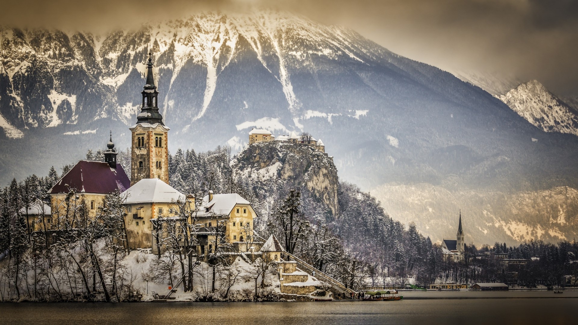 Winter landscape of Lake Bled with church and mountains HD Wallpaper