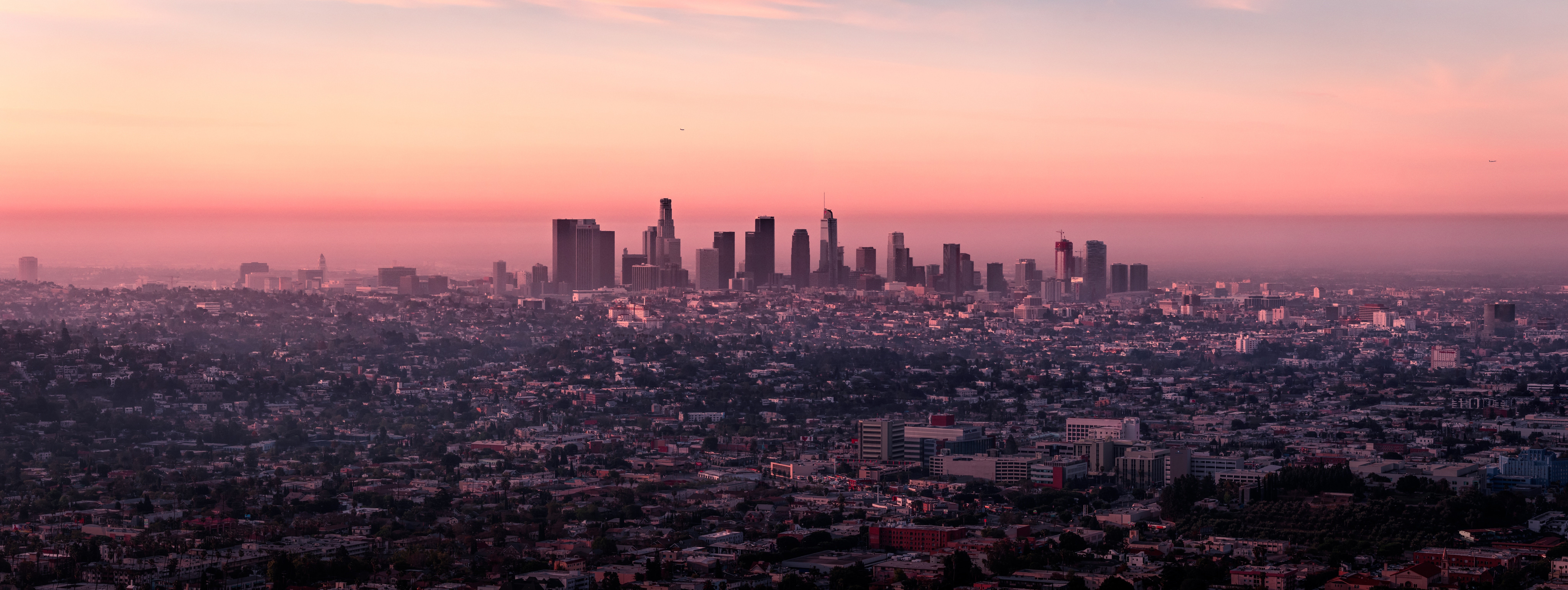 Los Angeles cityscape at sunset with pink sky HD Wallpaper