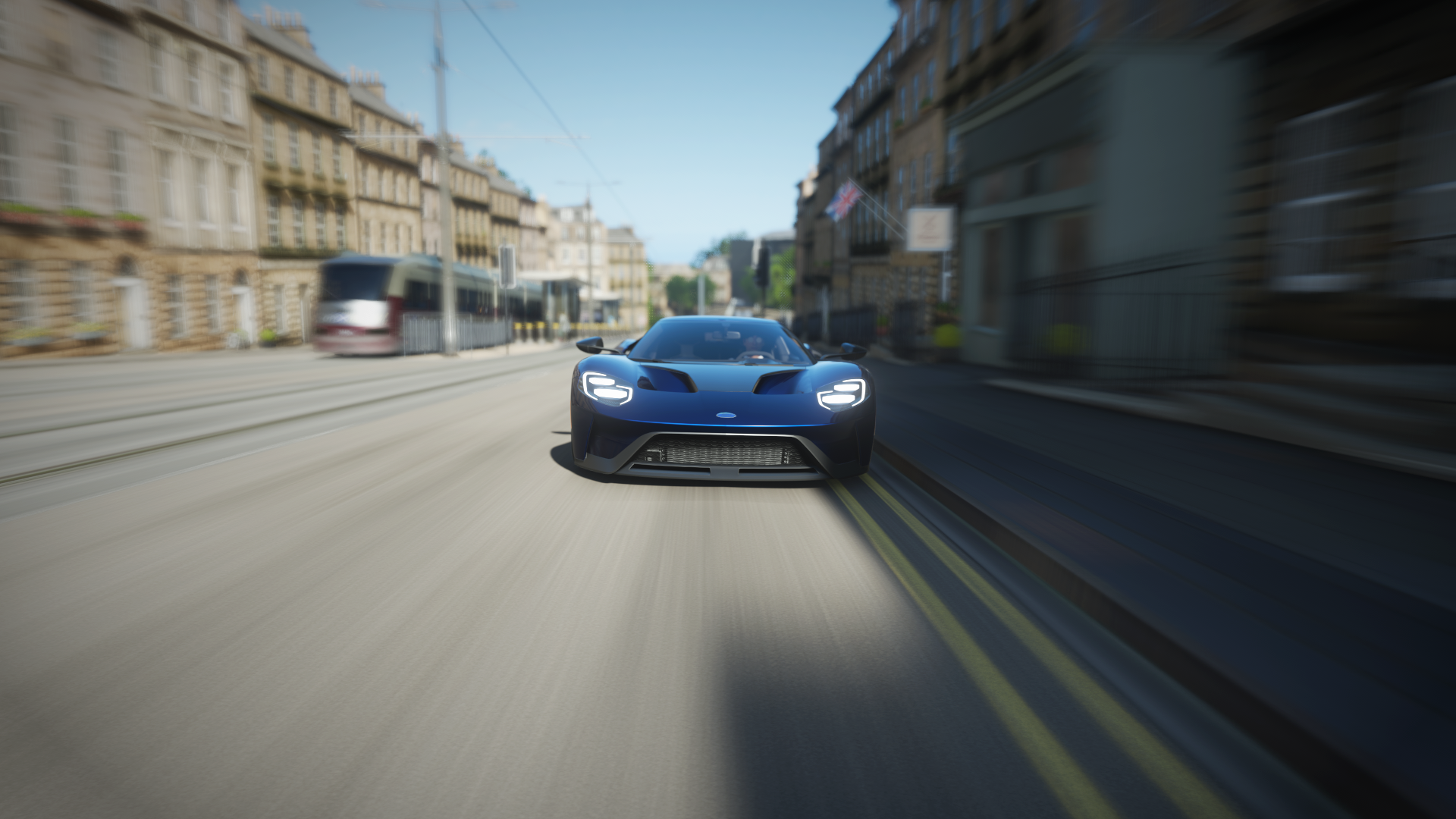 Ford GT driving on a city street with a tram HD Wallpaper