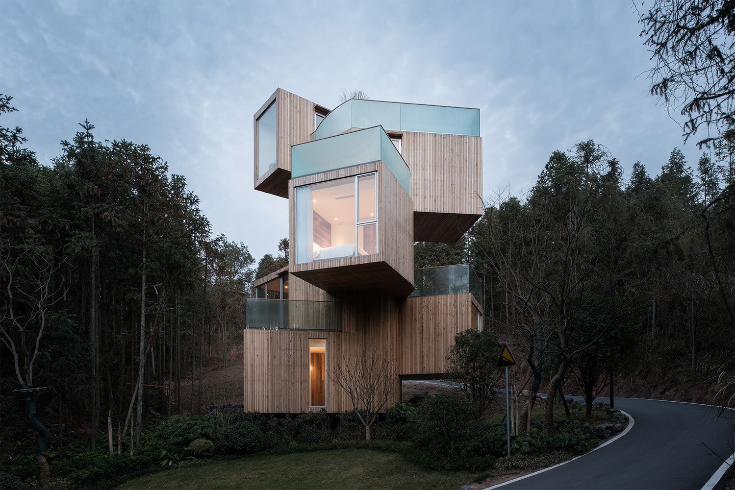 Modern wooden house in a forest HD Wallpaper