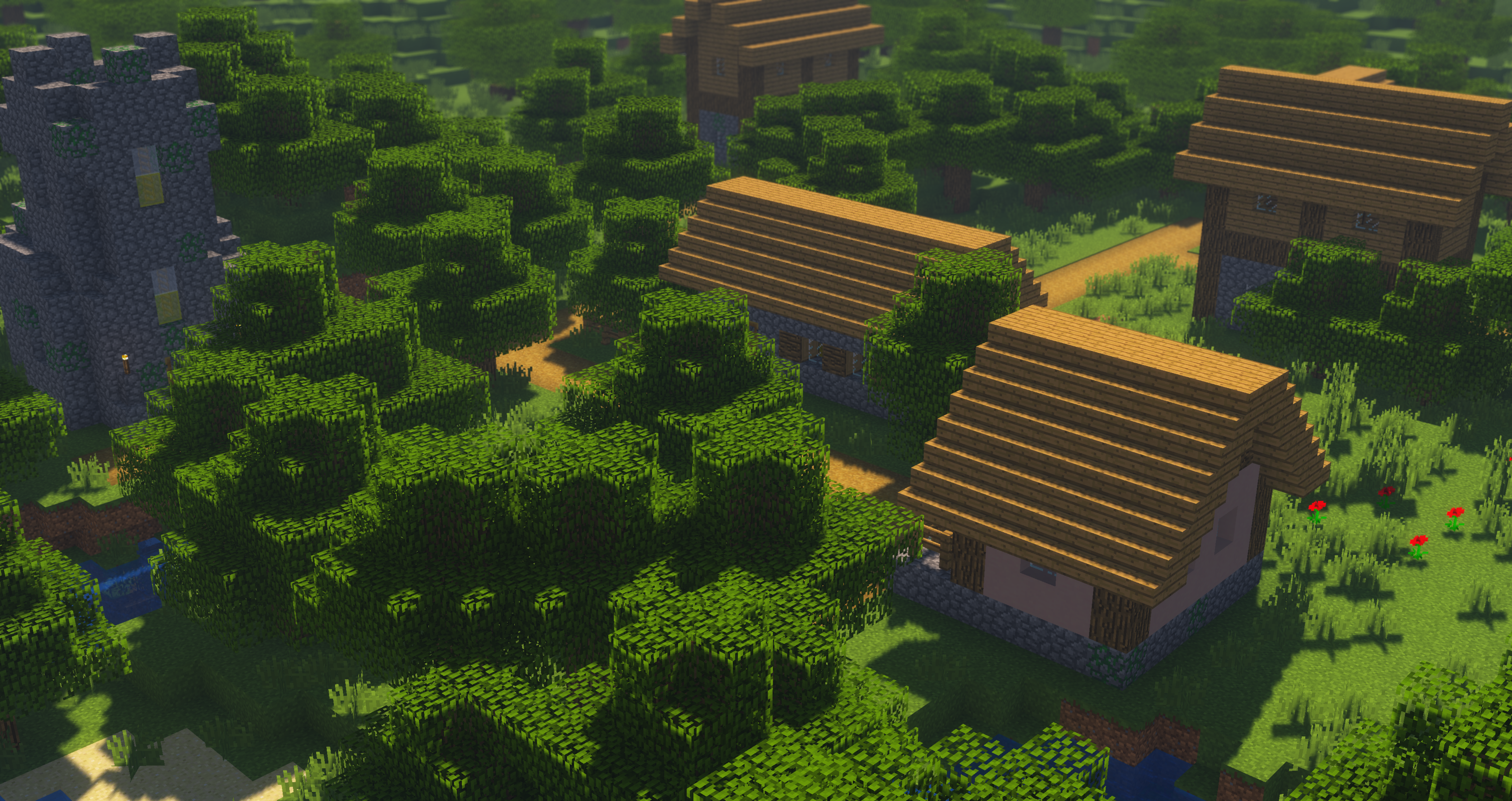 Minecraft village with stone tower and trees HD Wallpaper