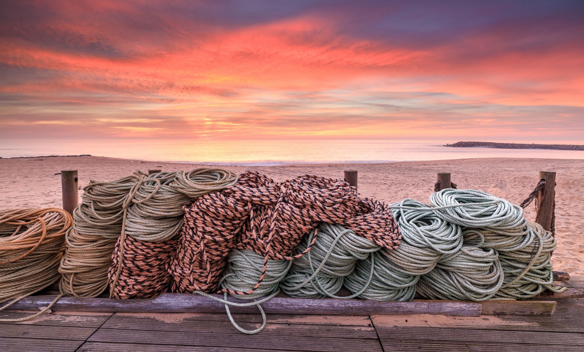 Ropes on a beach at sunset HD Wallpaper