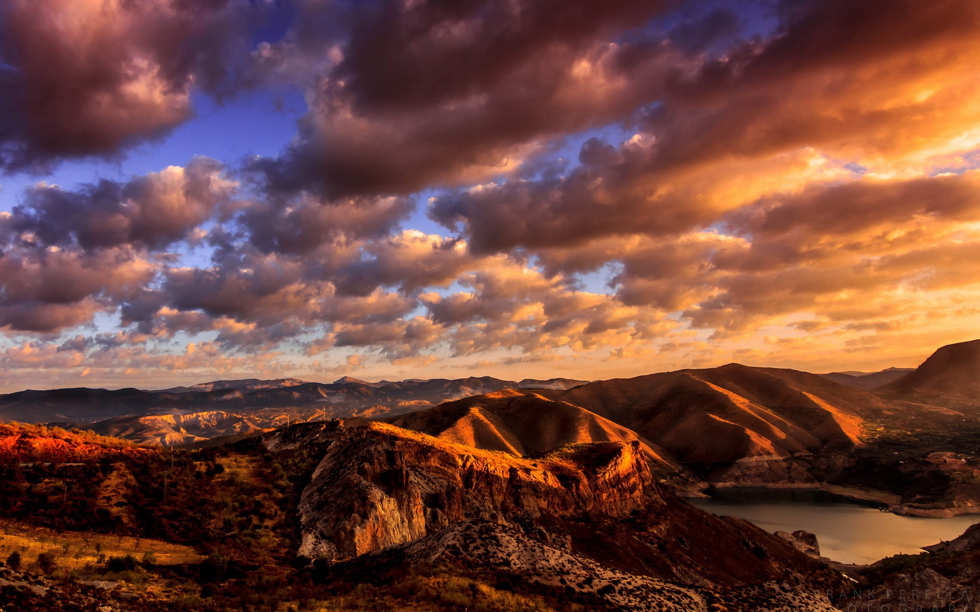 Mountainous Landscape with Dramatic Sunset Clouds and Lake HD Wallpaper
