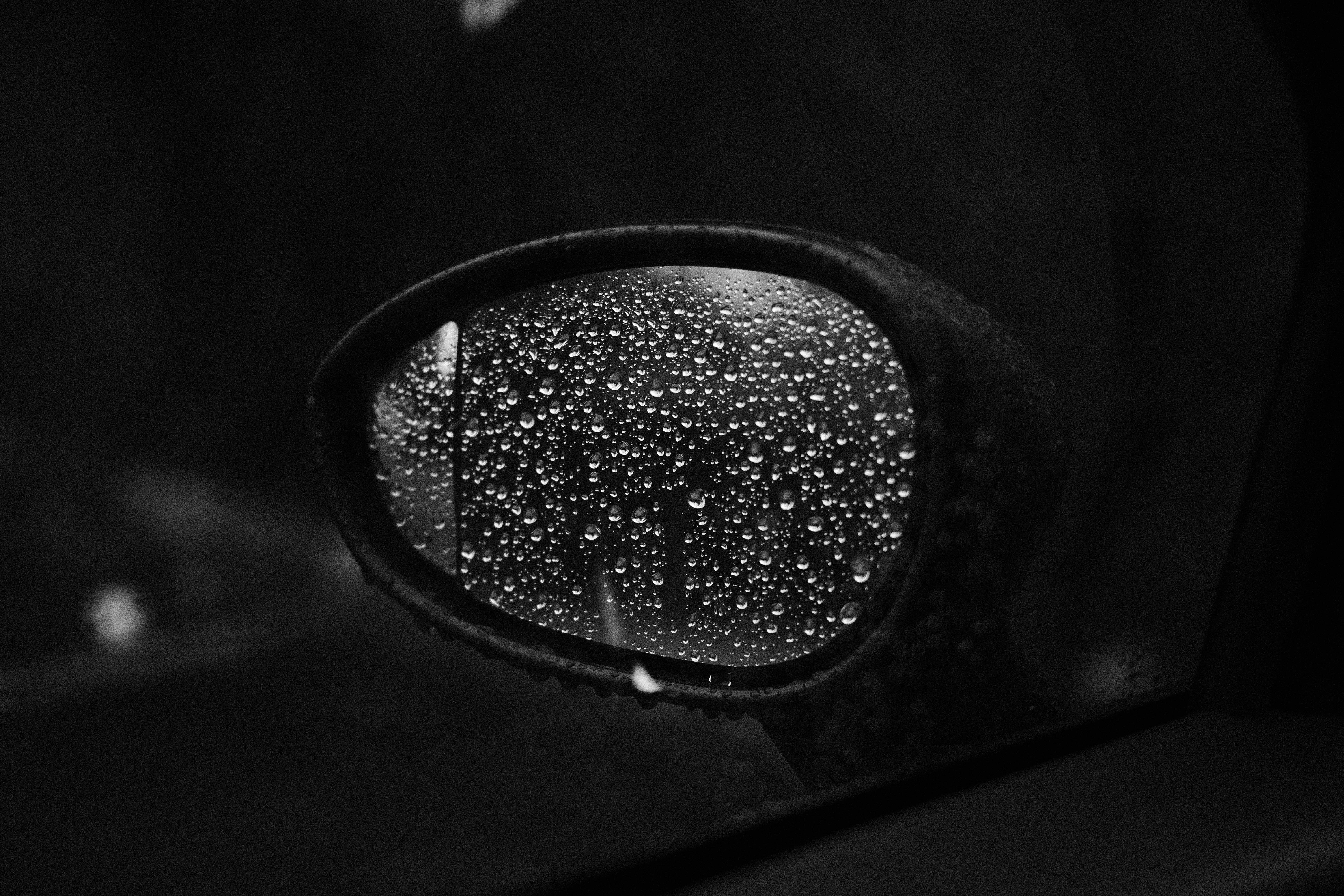 Monochrome car mirror with raindrops HD Wallpaper