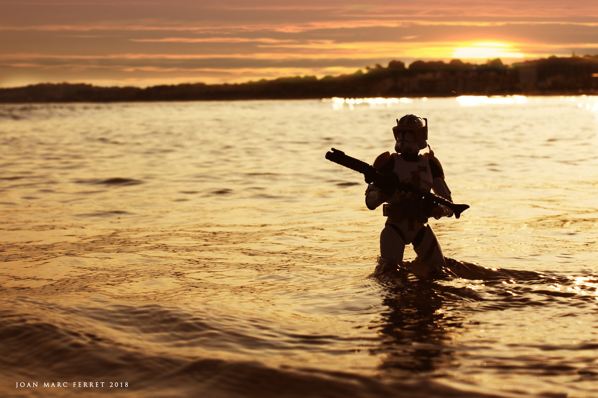 Star Wars Clone Trooper action figure in water at sunset HD Wallpaper