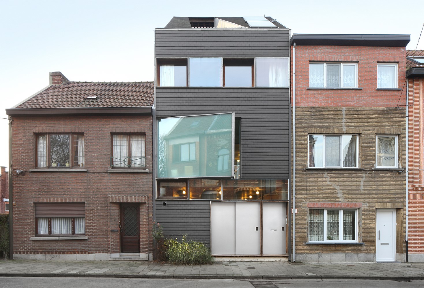 Modern house facade with large glass window HD Wallpaper
