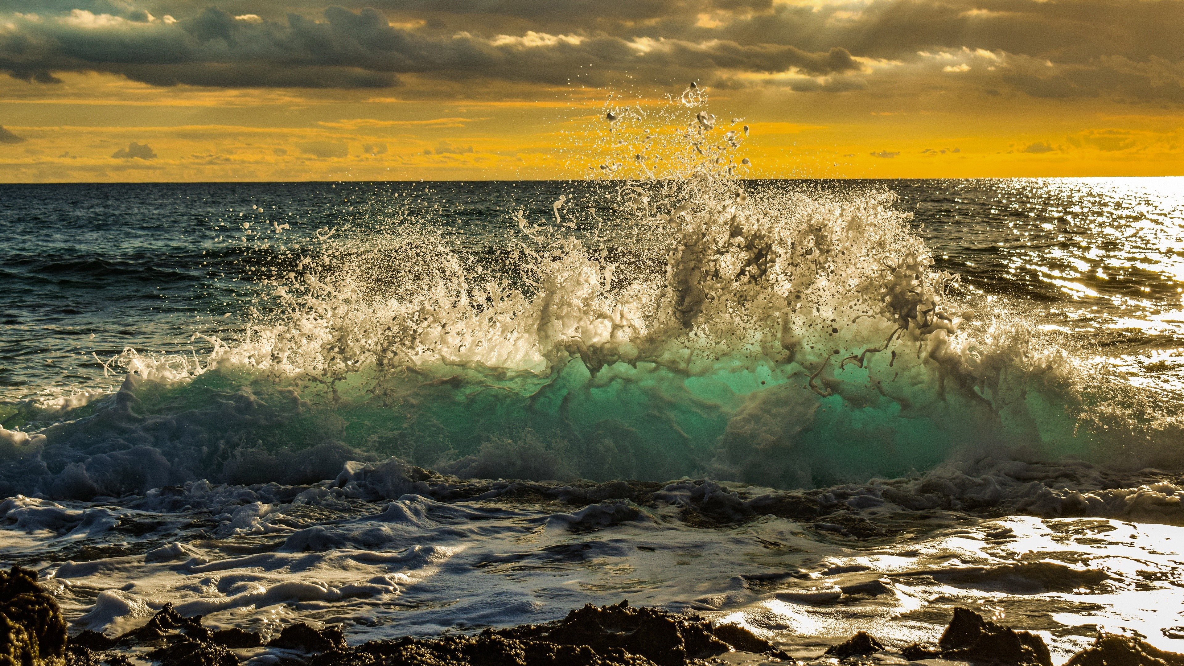 4K Ocean Wave Crashing on Shoreline at Sunset HD Wallpaper