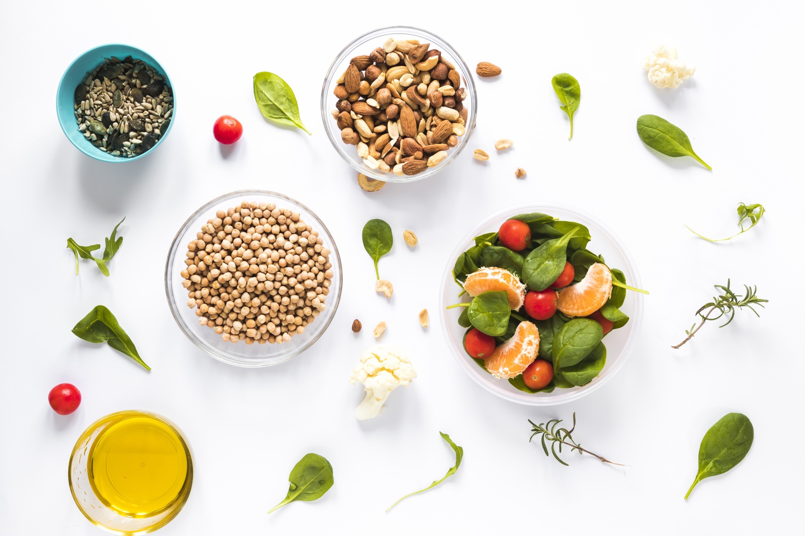 Salad ingredients with olive oil and nuts HD Wallpaper