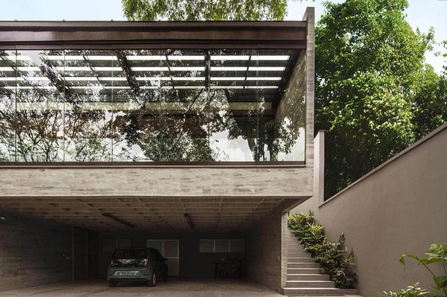 Modern house with concrete and glass facade HD Wallpaper