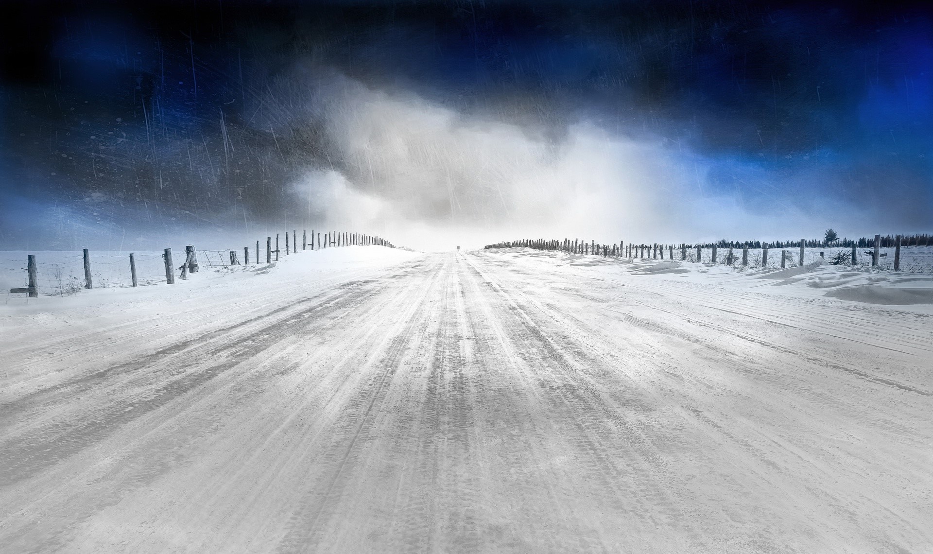 A lonely road in a winter storm HD Wallpaper