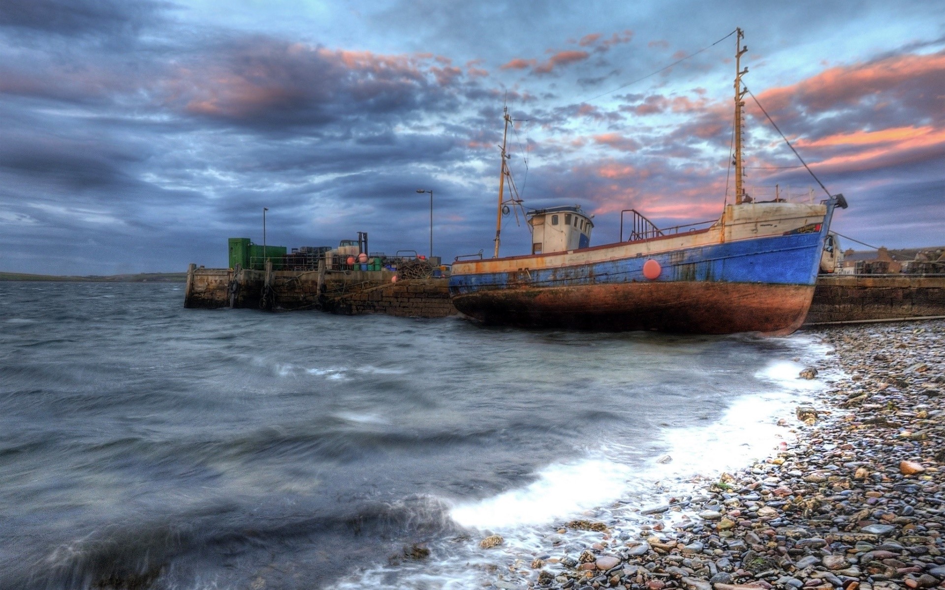Boat docked at a harbor during sunset HD Wallpaper