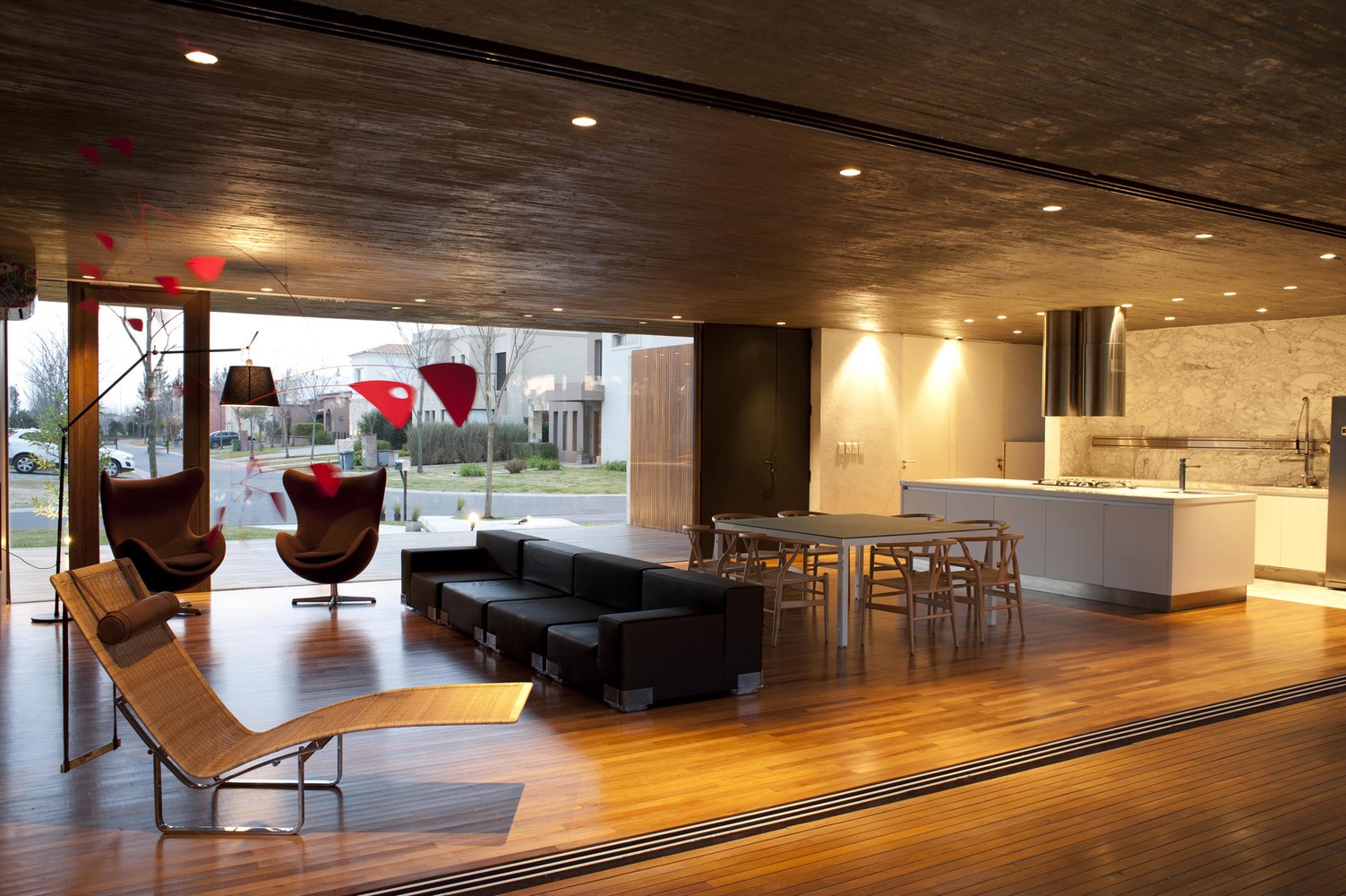 Modern living room and kitchen with open plan design HD Wallpaper