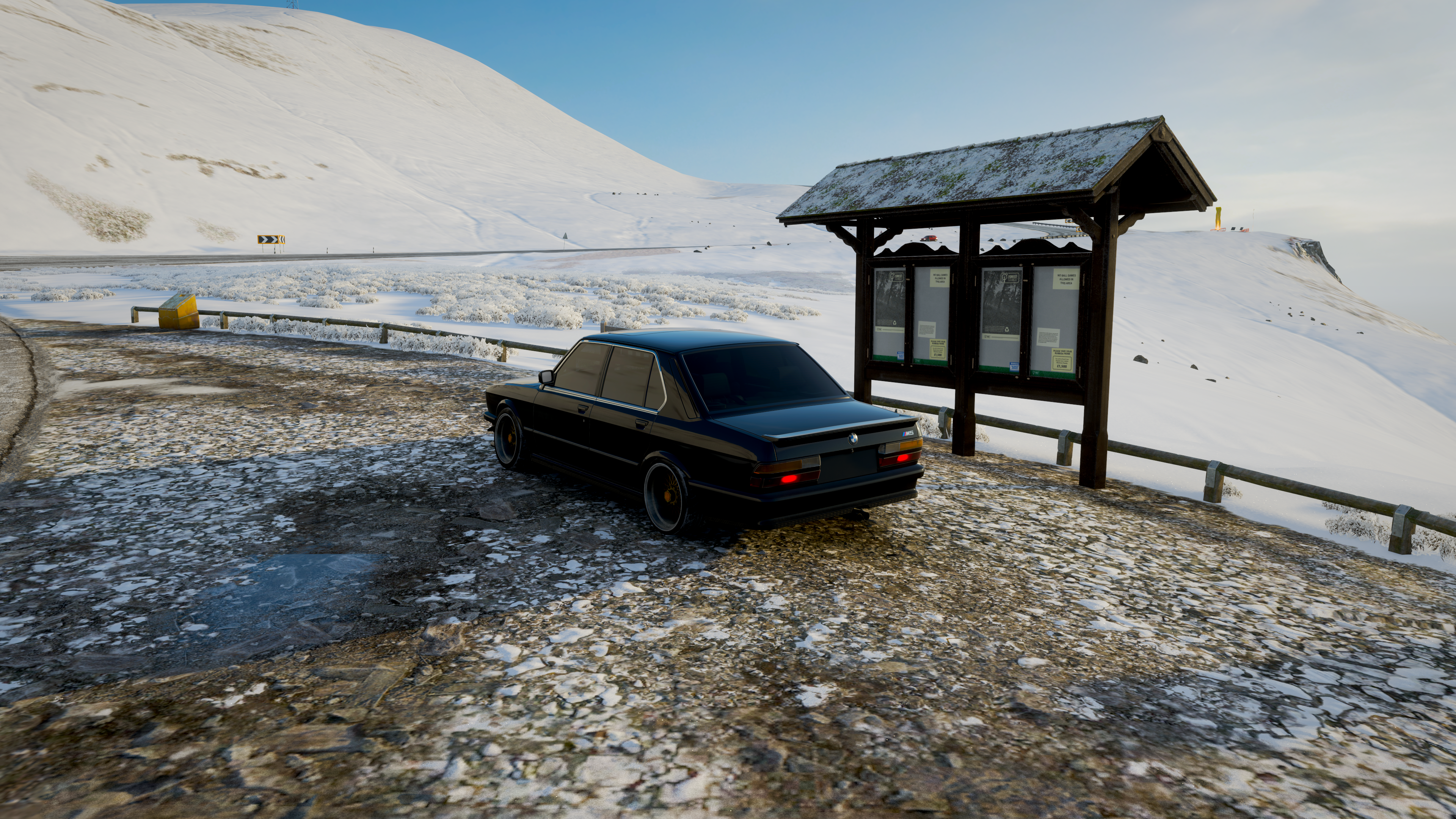 Black BMW E28 in a Snowy Landscape HD Wallpaper