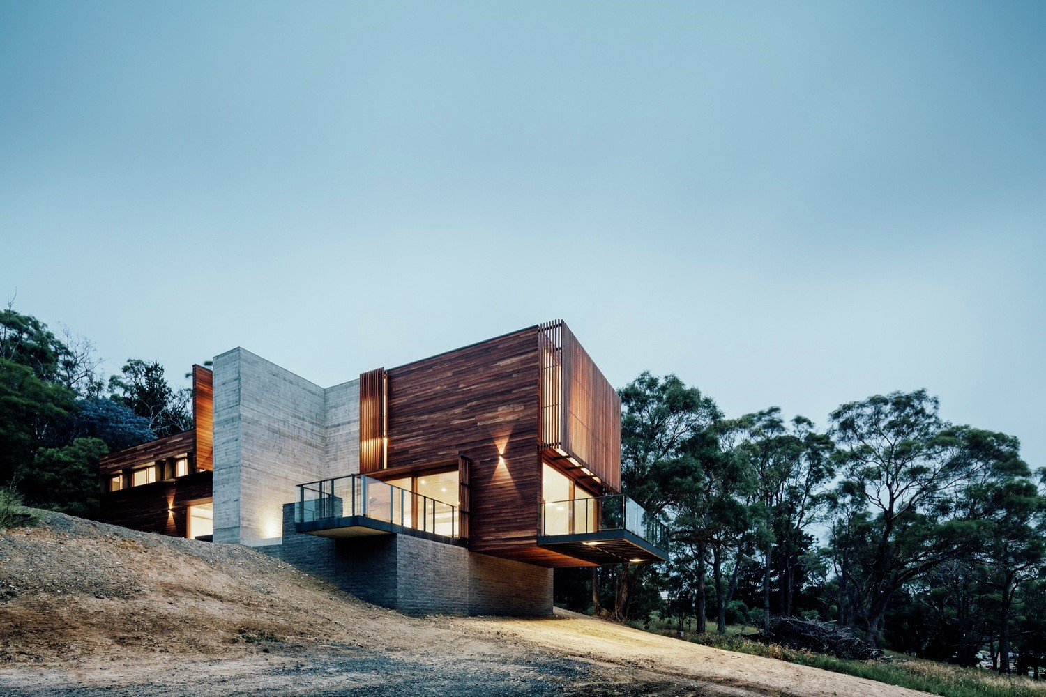 Modern house with concrete and wood exterior HD Wallpaper