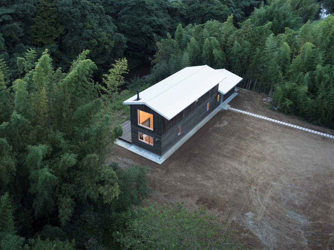 Modern wooden house in a forest HD Wallpaper