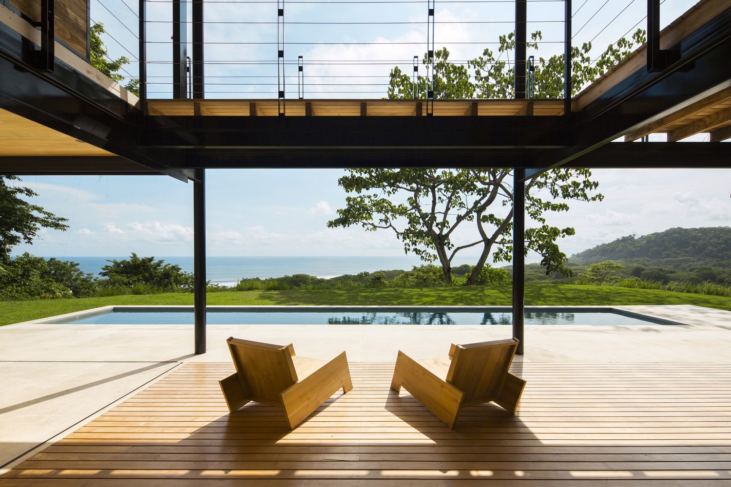 Modern house with swimming pool and ocean view HD Wallpaper