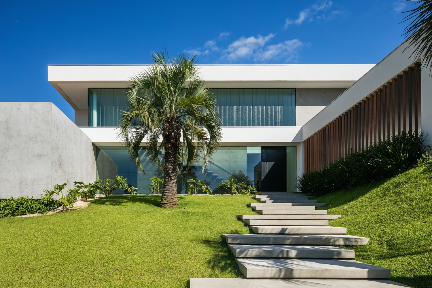 Modern house with concrete and wood facade HD Wallpaper