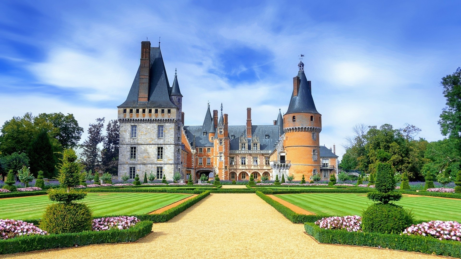 Chateau de Pierrefonds castle in France with manicured gardens HD Wallpaper
